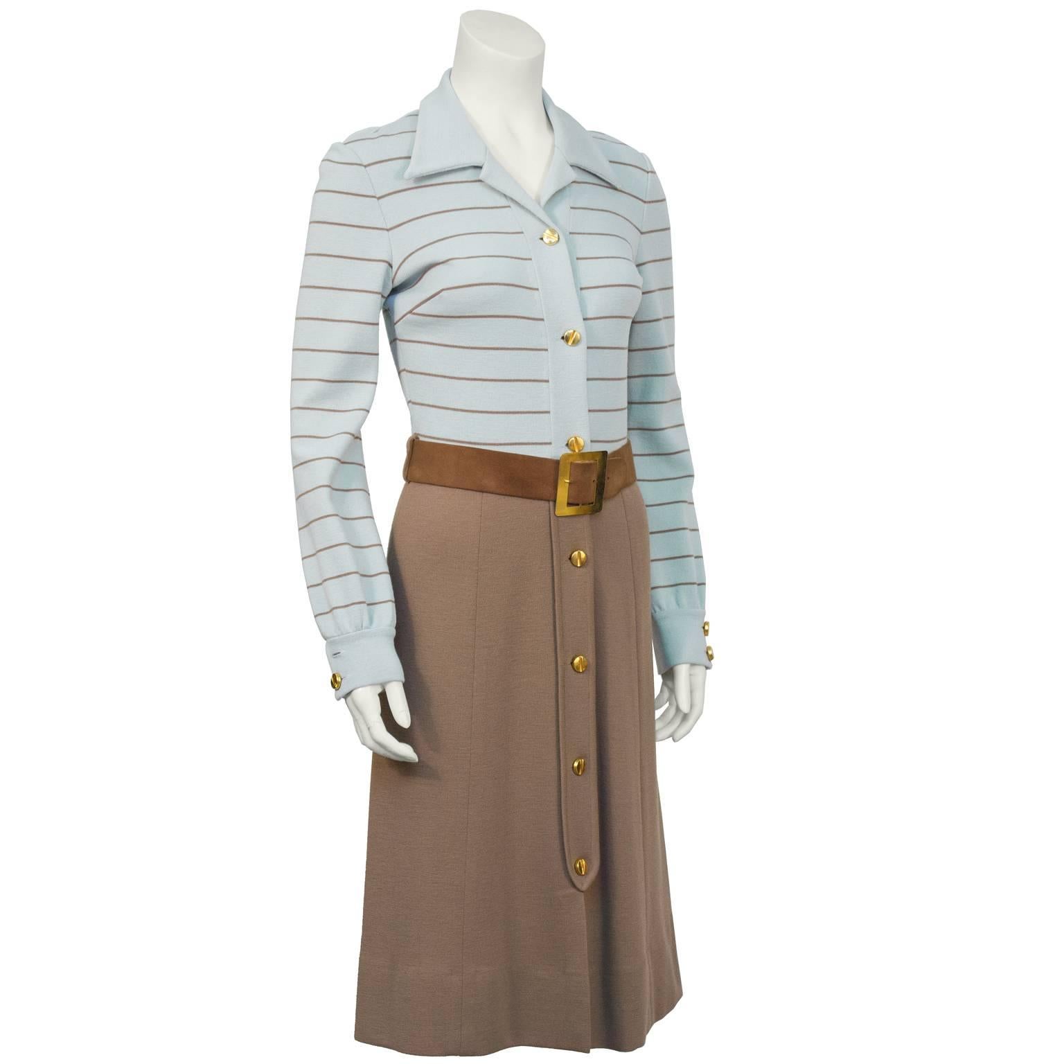 Classic Italian designed 1960's blue and brown A-line knit day dress with matching brown suede belt. The effortless ensemble has a baby blue knit bodice with brown stripes, a notched lapel and bust darts. The taupe brown knit skirt starts at the