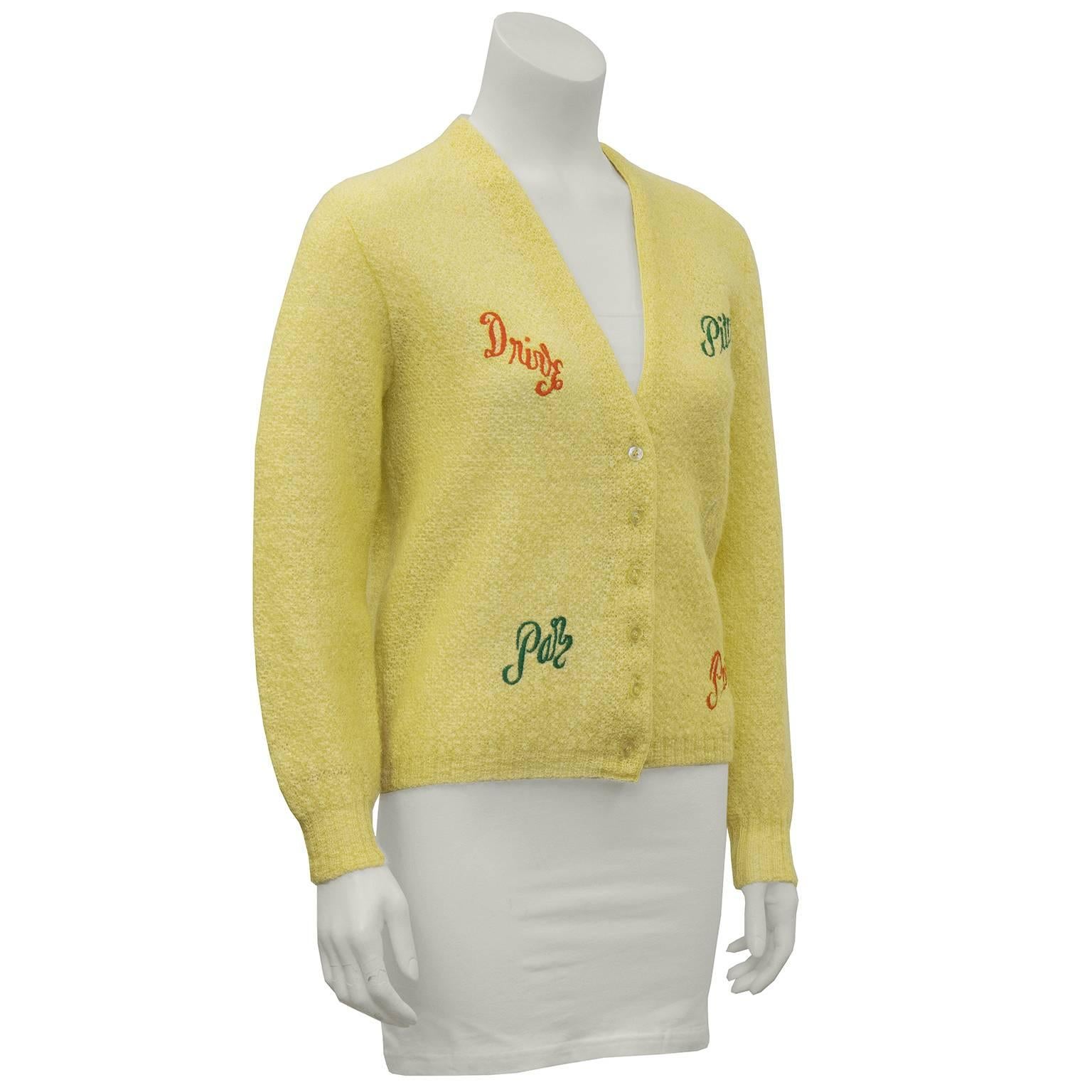 Fantastic ladies novelty golf cardigan circa 1950 with embroidered golf themed  decals positioned tastefully on the front. The perfect piece for the fashionable golfer who dresses to impress. Made for Saks 5th Ave, Active Sportswear Line. Excellent