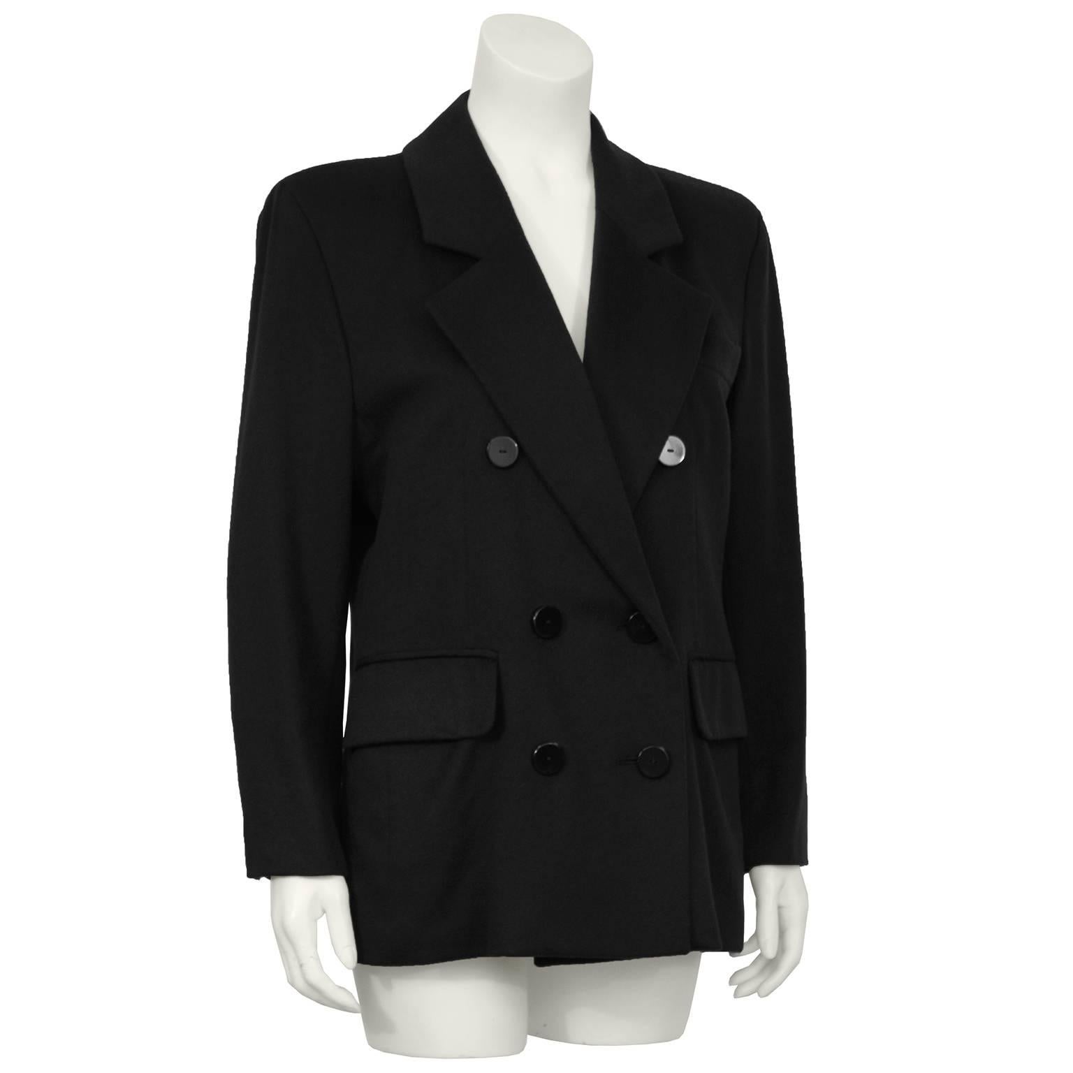 Classic double breasted cashmere blazer from Yves Saint Laurent made in the 1980's. Nothing more versatile than black cashmere to finish off today's day to evening apparel. In excellent condition fits like a US size 6.

Sleeve: 22