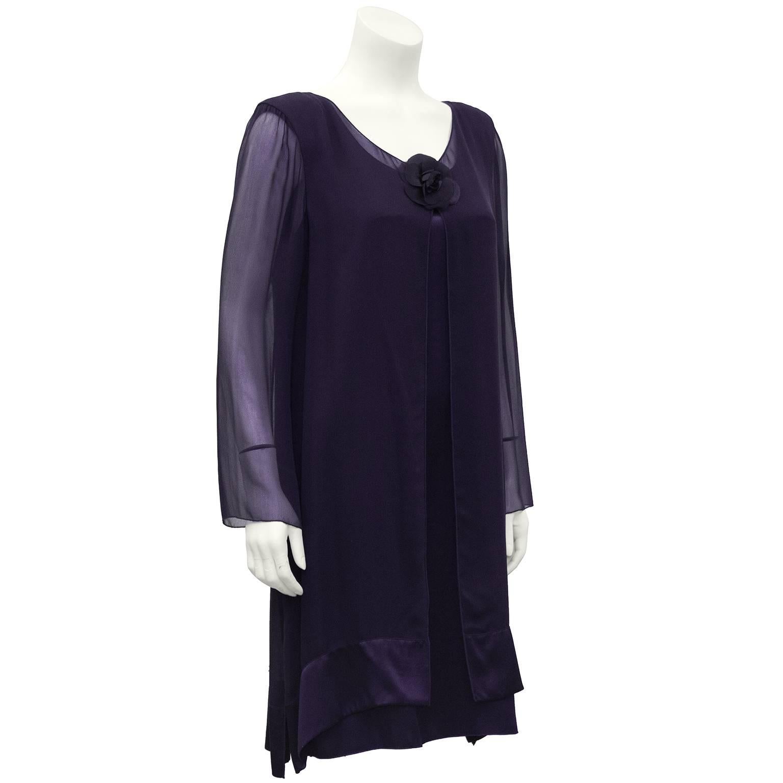 1980's Holly Harp deep purple long sleeve chiffon overlay swing style dinner dress with satin gardenia at the neck and satin banding around the hem. Elegant sleeveless under-dress. Fits like a US 8-10. In excellent condition.

Sleeve 18