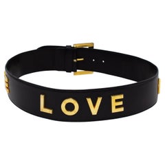 Cintura "LOVE" nera e oro di Rena Lange degli anni '90 Cintura "LOVE" nera e oro di Rena Lange degli anni '90