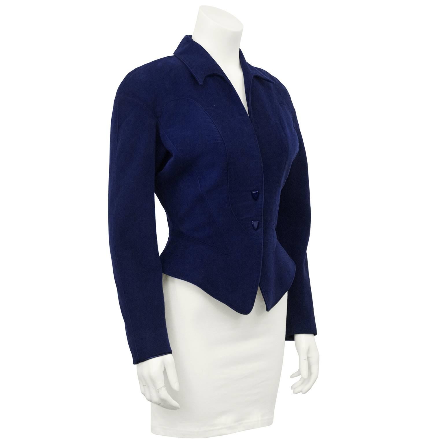 Super sexy and flattering Thierry Mugler navy cotton velvet jacket from the 1980s. Known for making clothing that hugged every curve of a woman's body, Mugler's pieces are effortless and chic as well as sophisticated. This beautiful jacket is in his