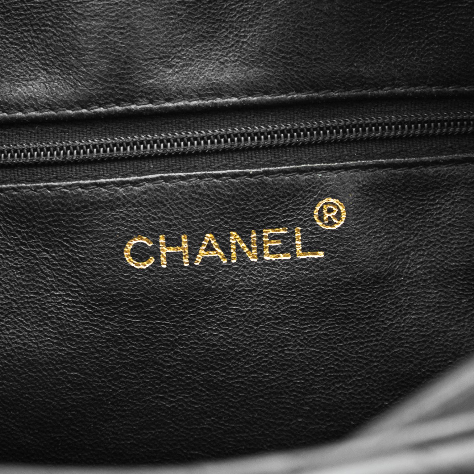 Chanel Black Quilted Lambskin Leather Diagonal Pocket Camera Bag In Good Condition In Toronto, Ontario