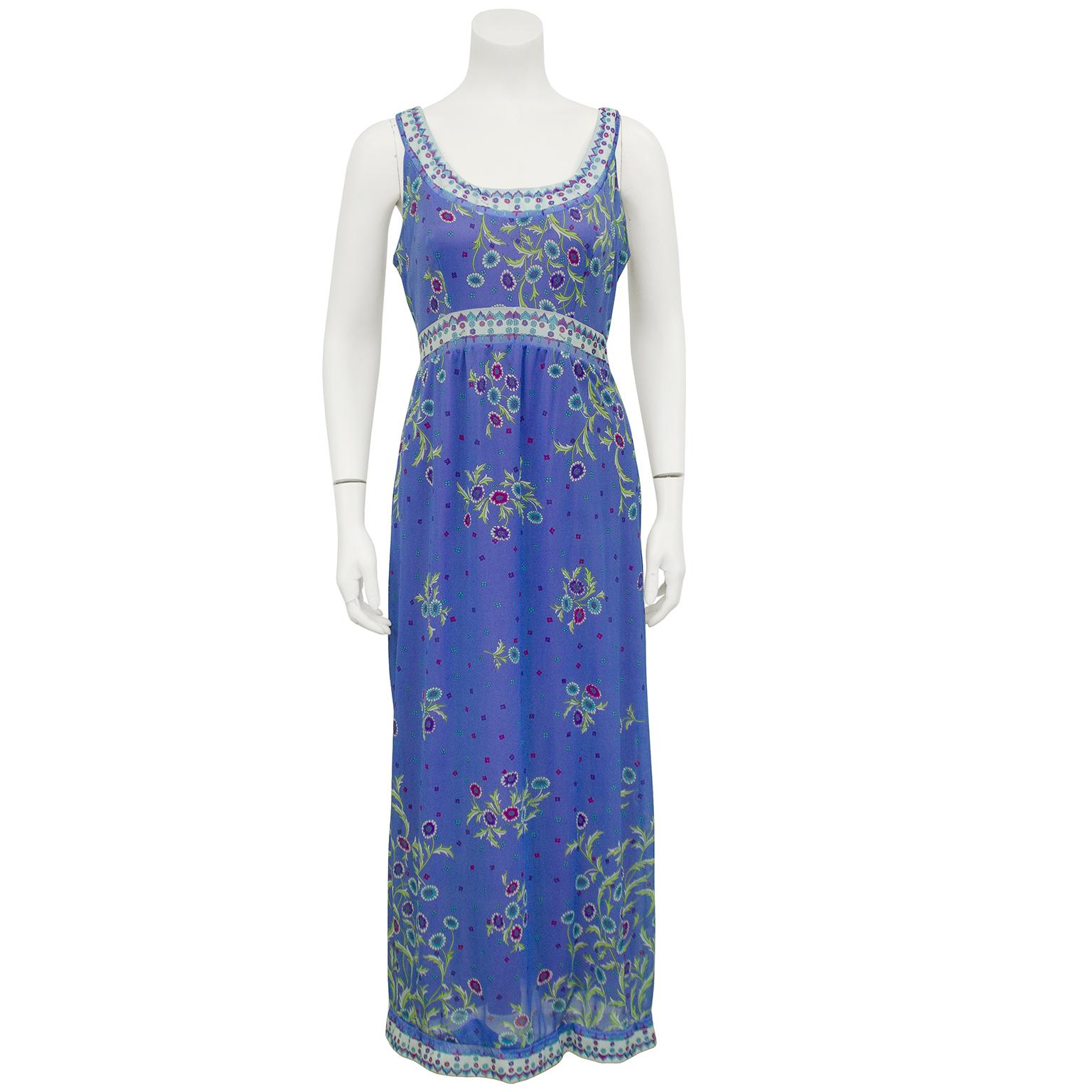 Emilio Pucci for Formfit Rogers maxi dress with matching kimono style jacket. Both pieces are made from printed nylon with a flower motif on a purple background. The dress is accented at the empire bust, hemline and neckline with a white floral