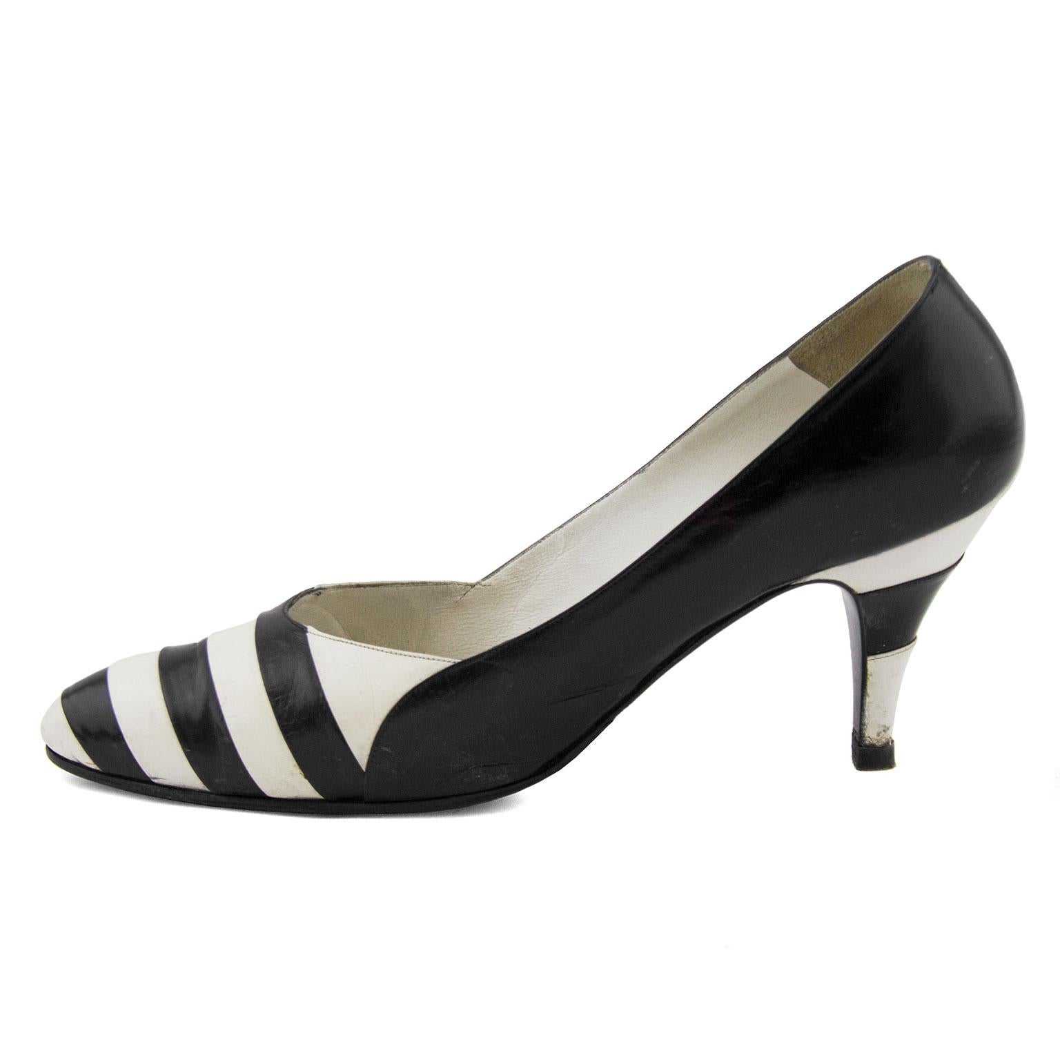 Black and white striped leather pumps from Susan Bennis Warren Edwards. The heel is also covered in black and white leather stripes. In good vintage condition with wear to the toe box where it would naturally crease with wear, and some scuffing on