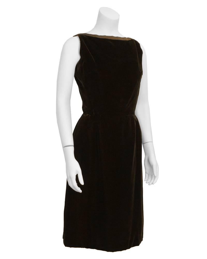 The most beautiful LBD (little brown dress) from 1960's Christian Dior London, complete with hand stamped style number and label. Interior is corseted for perfect fit. Neck and back are trimmed with brown satin. Small keyhole cut out at mid back,