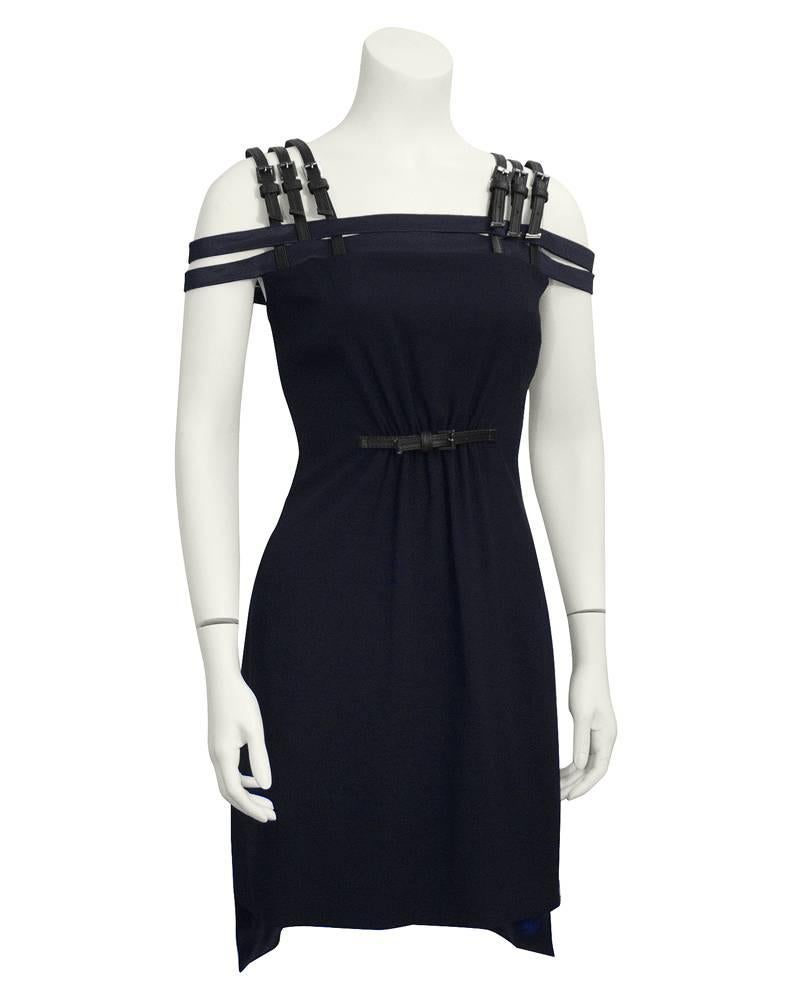 Edgy 1990's Versus navy blue silk mini cage dress. Three black leather vertical buckles lattice weave at shoulders through horizontal matching navy blue satin off shoulder straps. Matching black leather buckle at waist with minor gathering to add a