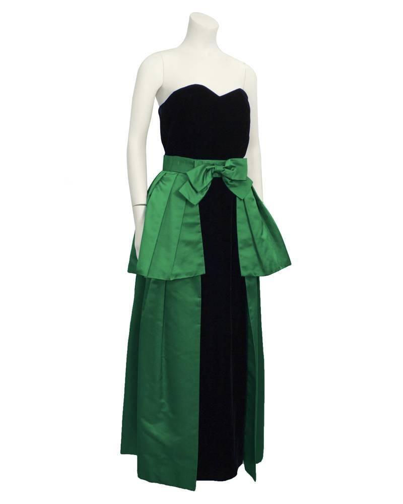 Ultimate show stopping mid 80's strapless velvet column gown with detachable emerald green satin wrap skirt. Not your everyday evening gown, full of drama and elegance. Fits like a US 4-6.

Dress: Bust 31