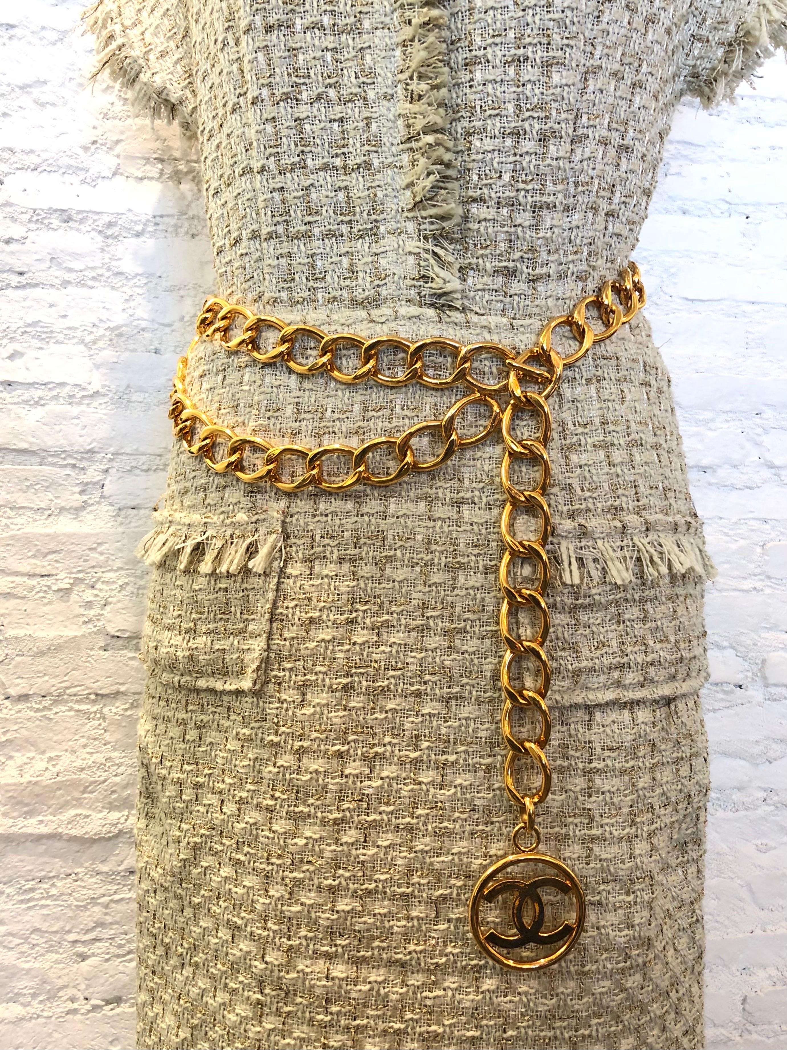 This vintage CHANEL chain belt is crafted of sturdy gold toned chains featuring a massive CC charm. Adjustable hook fastening. Chain excl. charm measures approximately 38 inches (96.5 cm) CC charm 5.6 cm. Stamped CHANEL 93A made in France. Comes