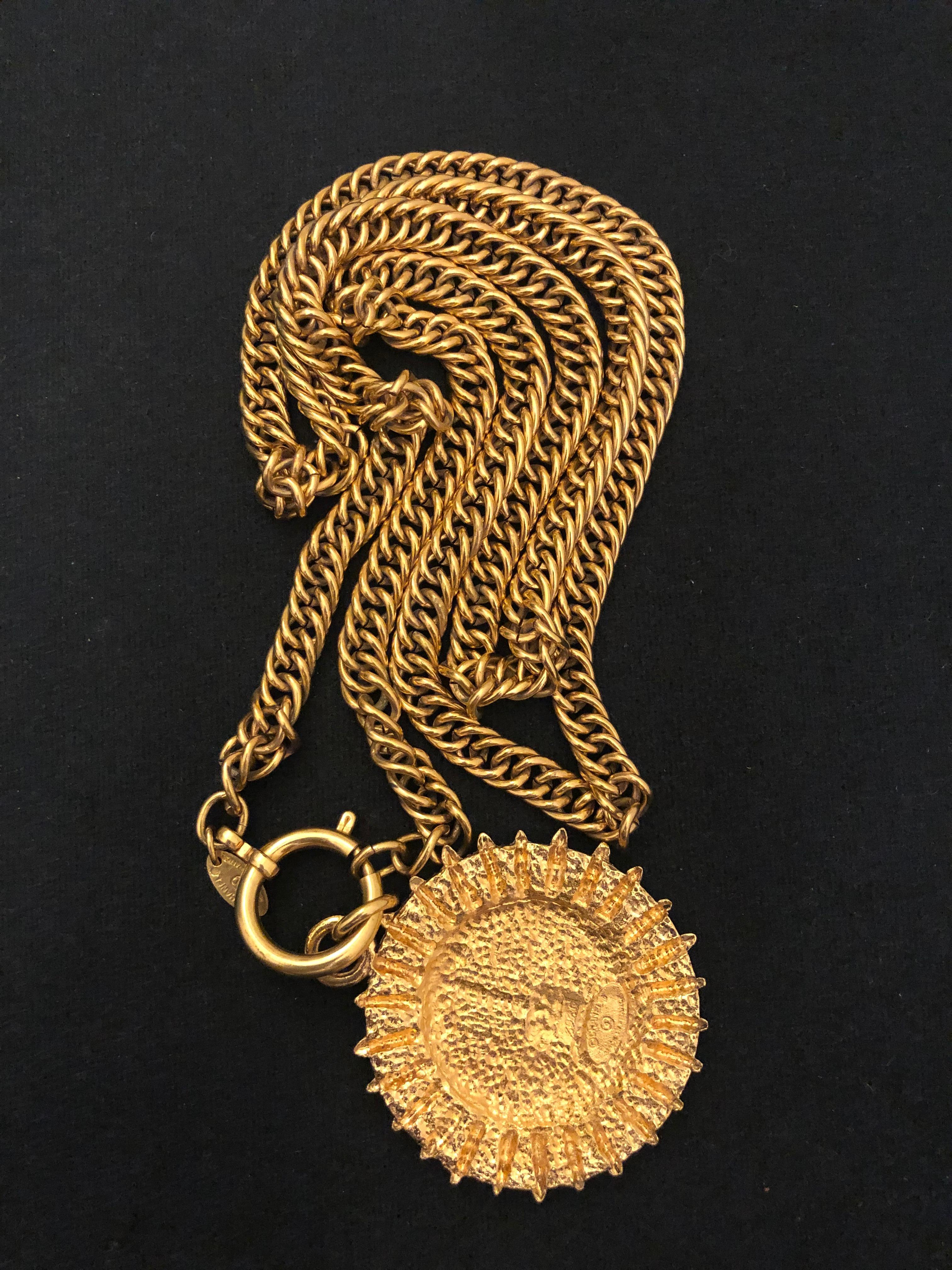 Women's or Men's 1980s Vintage CHANEL Gold Toned Lion Crest Ocean View Pendant  Necklace