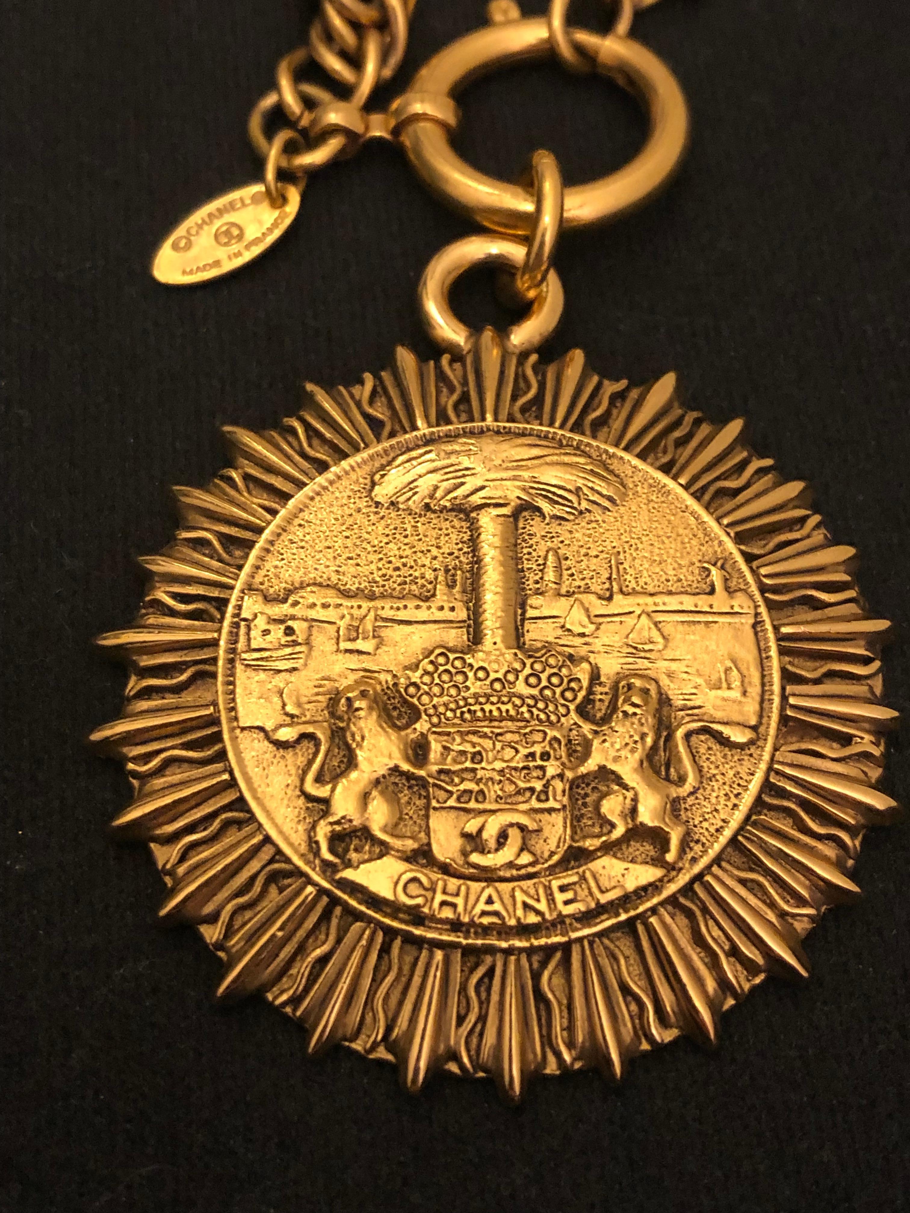 1980s Vintage CHANEL Gold Toned Lion Crest Ocean View Pendant  Necklace 1
