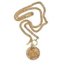 1980s Vintage CHANEL Gold Toned Lion Crest Ocean View Pendant Necklace