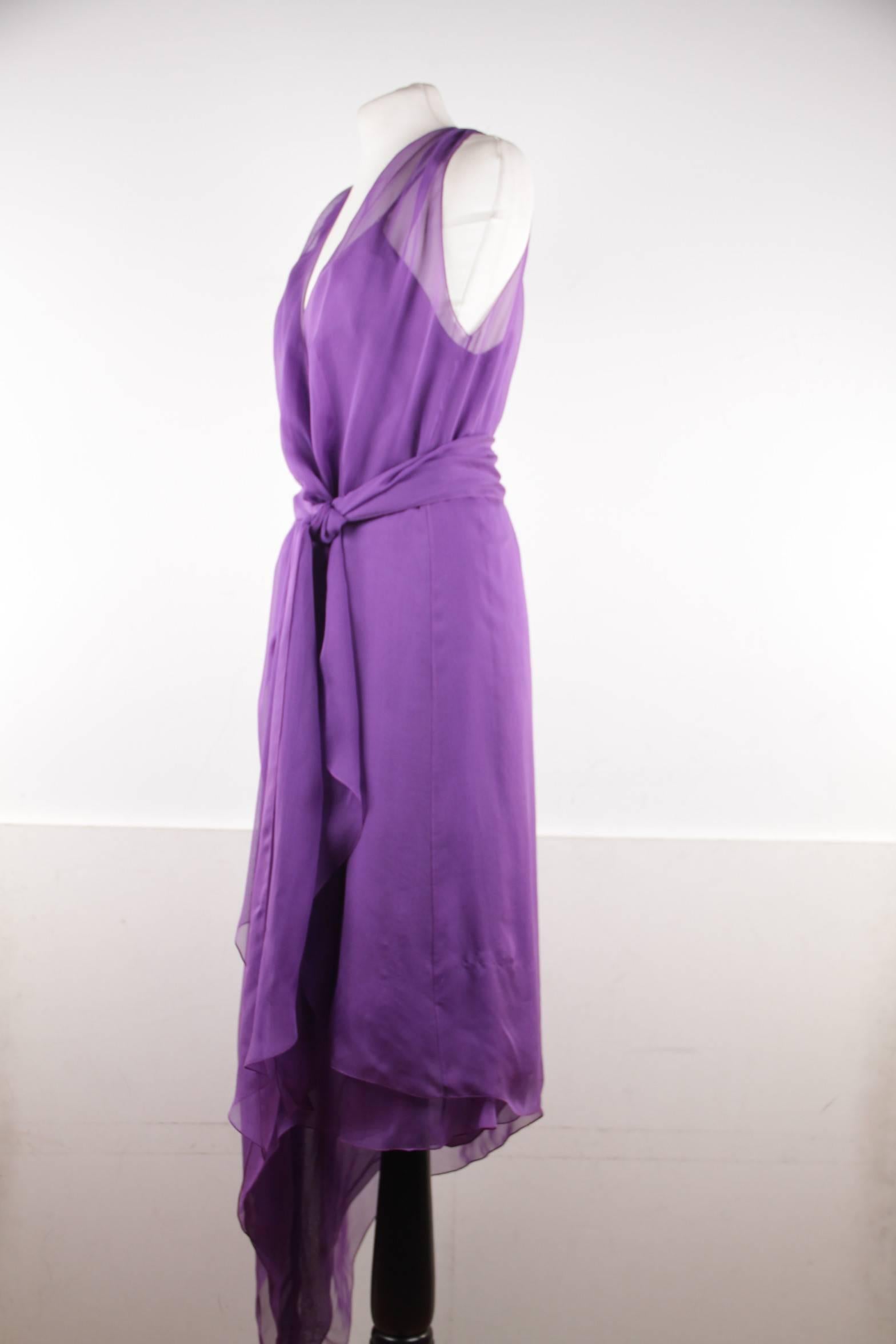 - Beautiful CHANEL elegant dress from a 2003 collection.
- Includes a dress and skirt (can be worn under or over dress for layering).
- Crafted in light shiffon silk fabric
- Purple color
- Deep V-nekline
- CC - CHANEL logos detailing on the