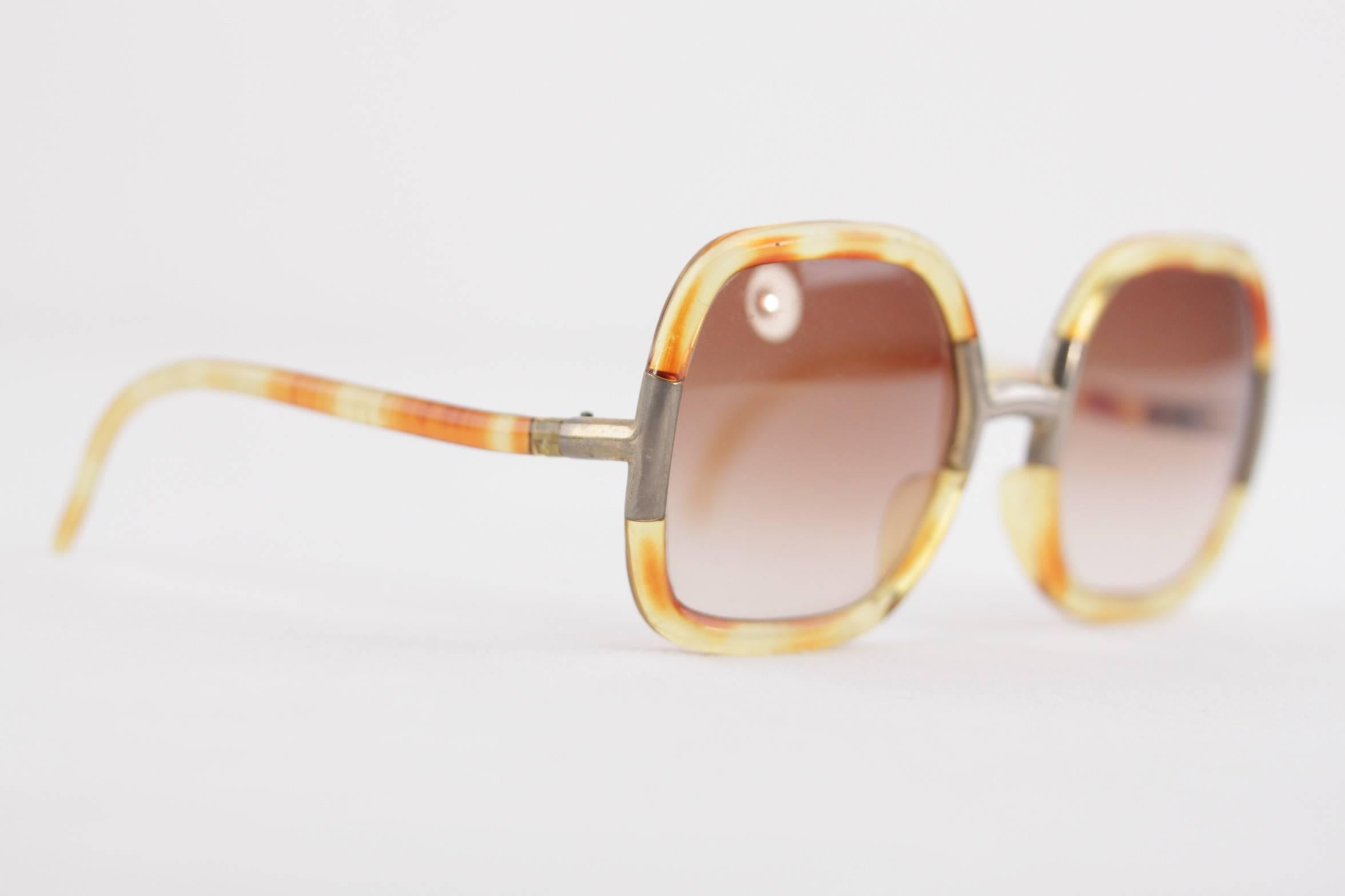  Brand: TED LAPIDUS

- Period / Era: Late 70s

- Vintage oversized sunglasses from the 70s by TED LAPIDUS. Honey brown tortoise look frame accented with gold and gardient brown gradient lens.

- Made in: France

- Fabric / Material: Plastic