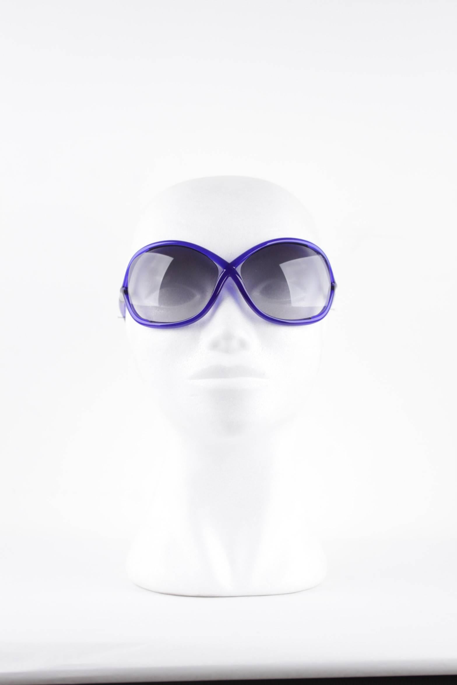 - WHITNEY TF9 sunglasses by Tom Ford
- Oversized soft round plastic sunglasses with iconic crossover detail
- Metal 'T' inserts on the tubular temples and cutaway lenses 
- Color: Blue
- Gradient 100% UV protection lenses
- Made in Italy
- Serial