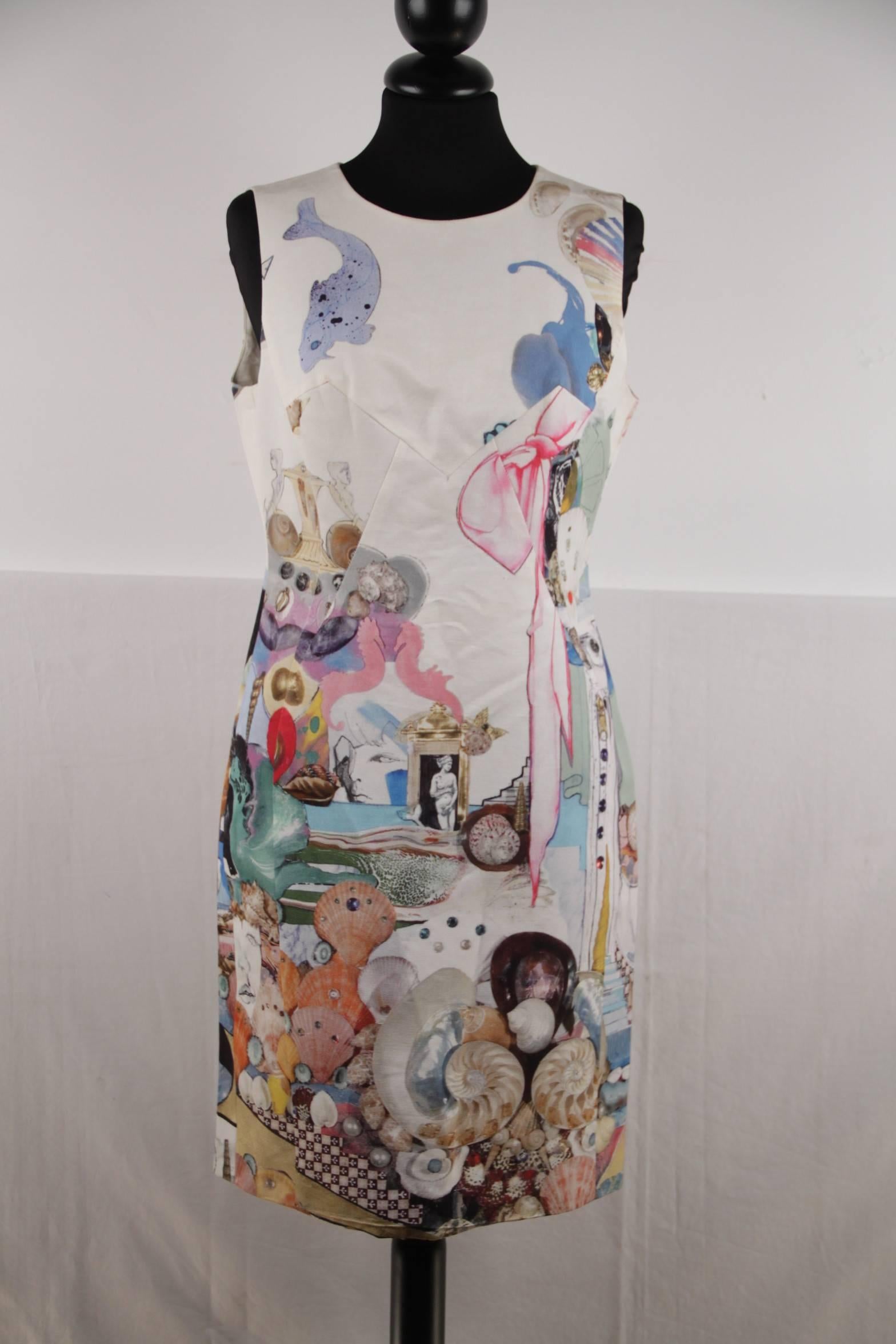  - Versace cotton blend sheath dress from the Spring/Summer 2009 collection

- Composition: 62% cotton, 38% viscose

- Sleeveless styling

- Multicolored print on white background

- Round neckline

- Lined

- Rear zip closure

-