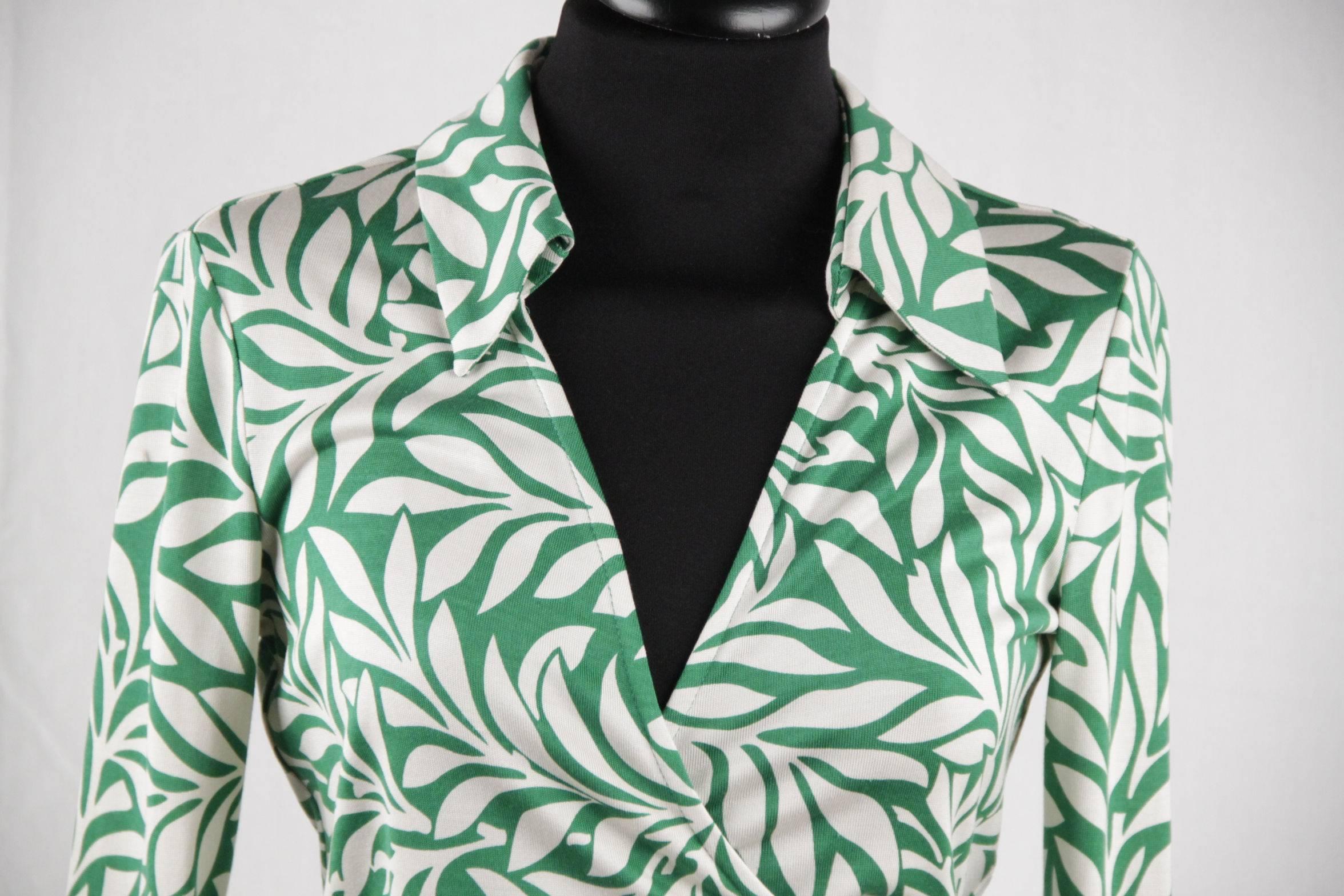 green and white blouse