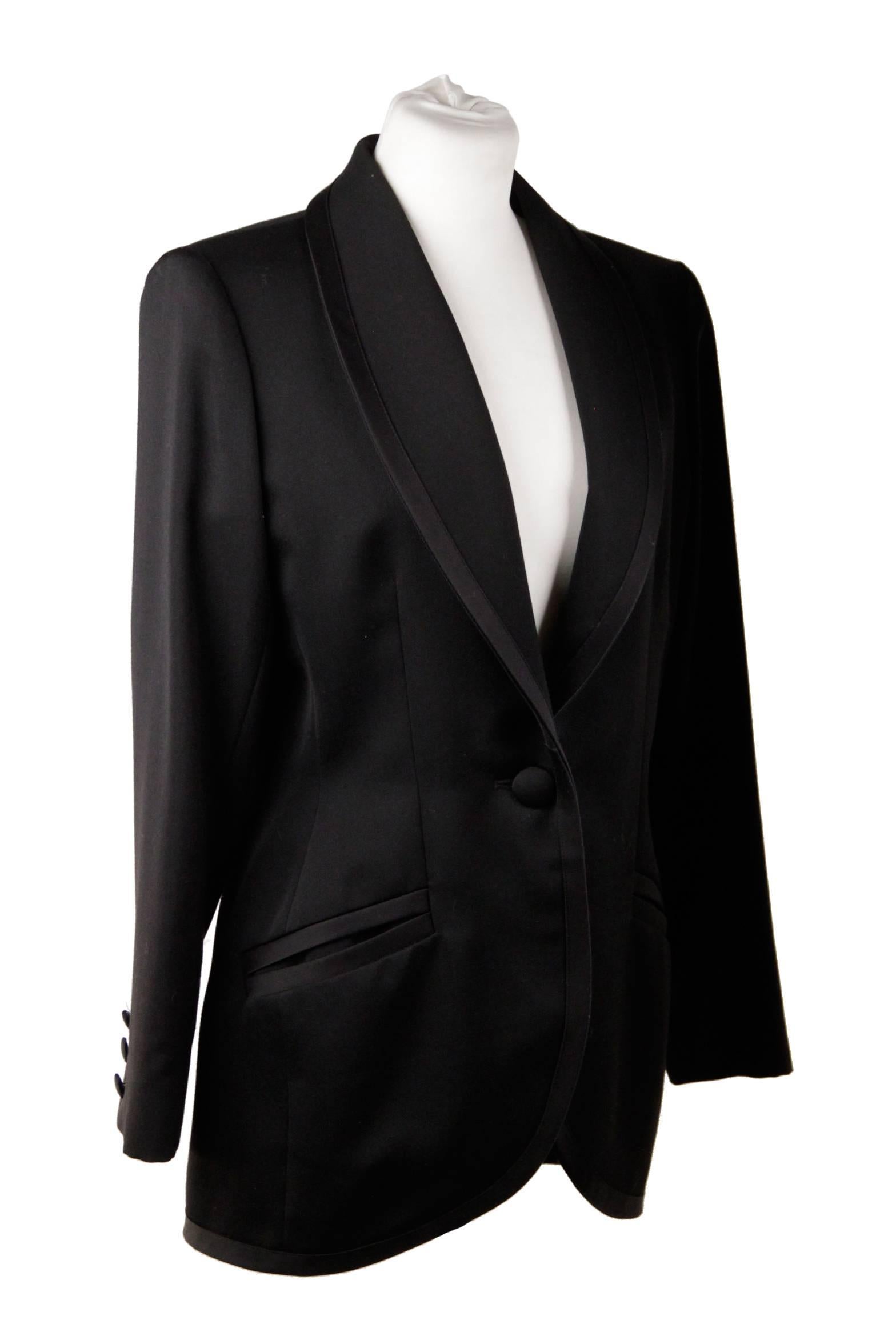 - YVES SAINT LAURENT VARIATION Tuxedo suit
- Black color
- Trousers with front button & zip closure
- Single button closure on the blazer
- Satin trim
- Size is not indicated. Estimated size is a SMALL/MEDIUM size

Logos / Tags: 'YVES SAINT