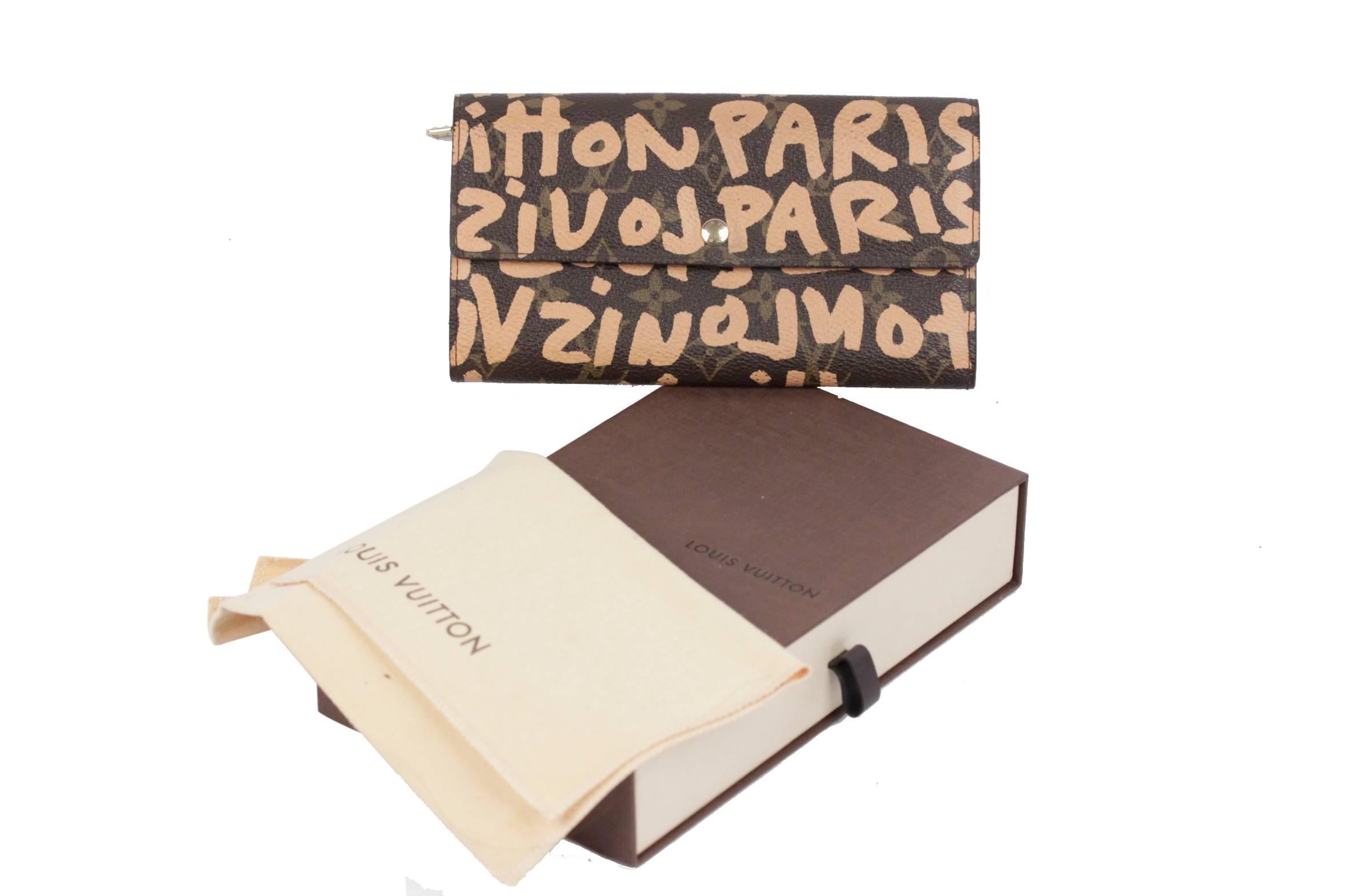  - LOUIS VUITTON Monogram Sprouse Graffiti Porte Monnaie Wallet
- This wallet is a limited edition by Stephen Sprouse, designed for the 2001' Louis Vuitton collection.
- timeless monogram canvas decorated with peach colored graffiti graphics
-