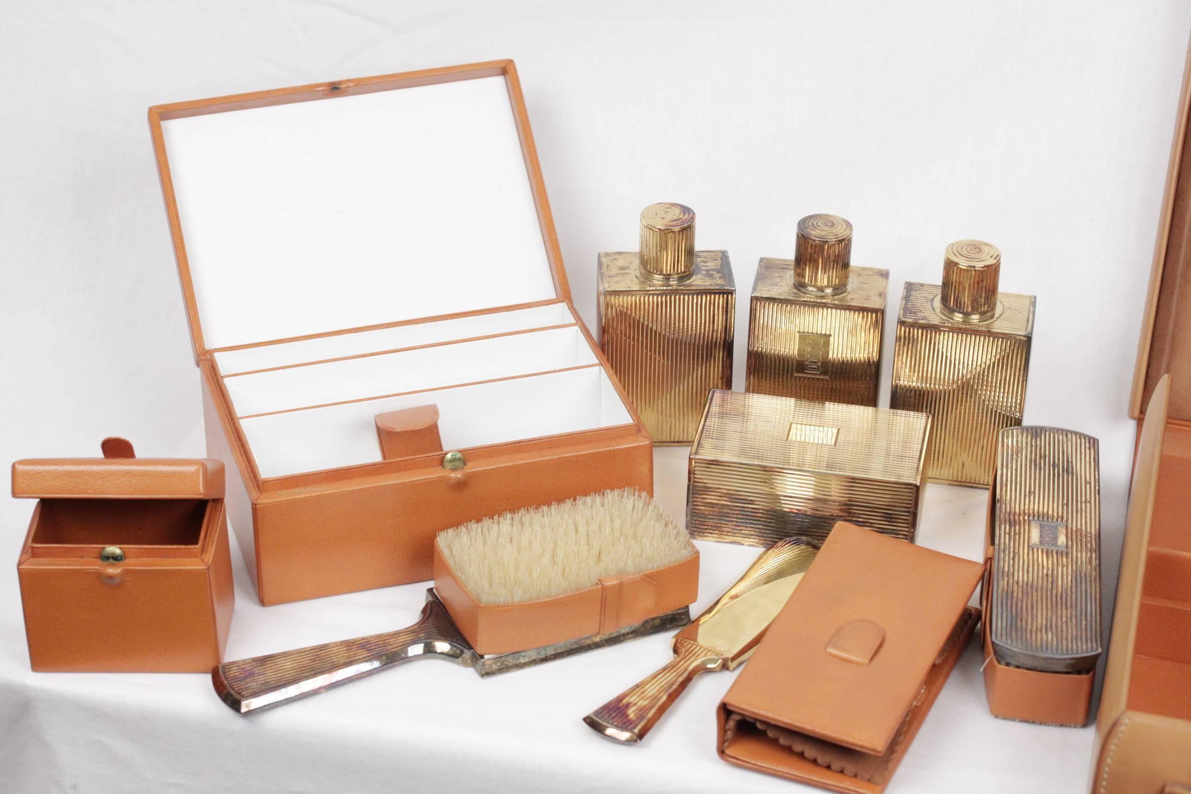 
- HERMES Paris 50’s Gentleman travel grooming set
- Case with handle in tan leather measurement 14 1/4 x 10 1/2 x 3 1/2 inches - 38,8 x 26,7 x 8,9 cm
- Double latch closure
- French vermeil silver pieces inside
- 3 silver bottles (4 1/2 x 2