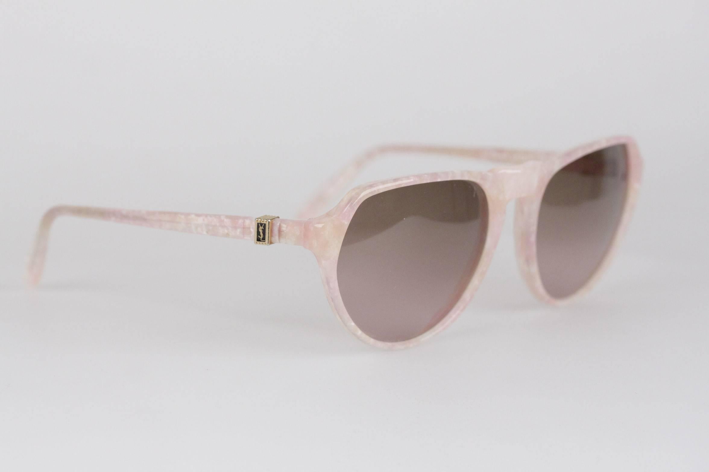- Vintage YVES SAINT LAURENT sunglasses, Made in France

- mod: PRIAM - 58/16 - 378

- Pink Marbled frame

- Light Brown MINT 100% UV GRADIENT lens

- Made in France

Any other detail which is not mentioned may be seen on the item