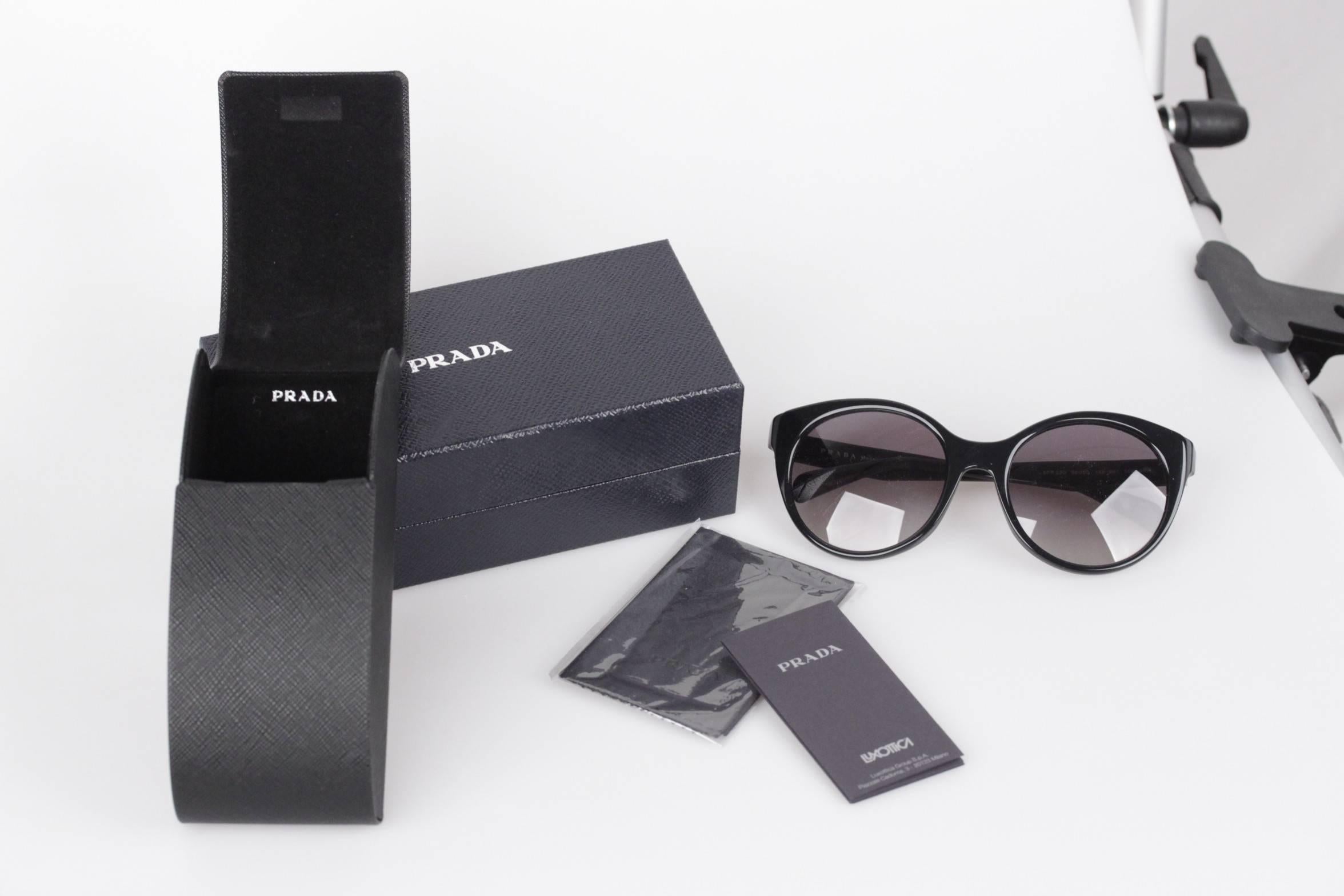 - PRADA sunglasses, made in Italy

- mod: SPR 230 - 56/20 - 1AB-3M1 - 140 - 2N

- Black ROUND CAT-EYE frame

- Retail Price + 250 USD

Condition: A+ :MINT CONDITION! Mint item. Never worn or used

Approx. measurements:

- TEMPLE LENGTH: