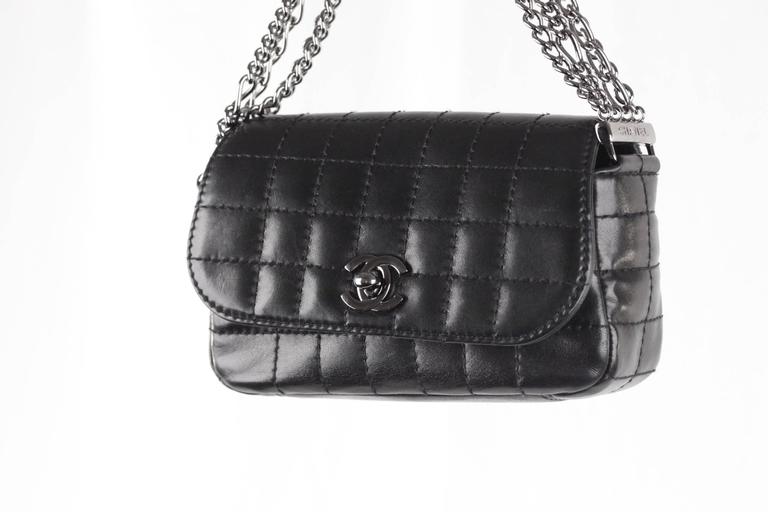 black quilted bag with chain handle