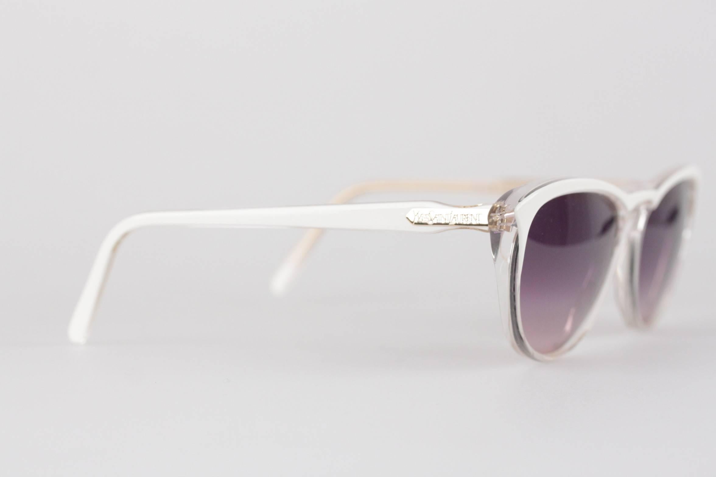 YVES SAINT LAURENT vintage MINT/PRISTINE Handmade Sunglasses

Mod. TIPHIS- 58/15 - 444 - Made in France

White cat-eye & transparent frame, with Purple GRADIENT 100% UV protection lens

Condition: A+ :MINT CONDITION! Mint item. Never worn or