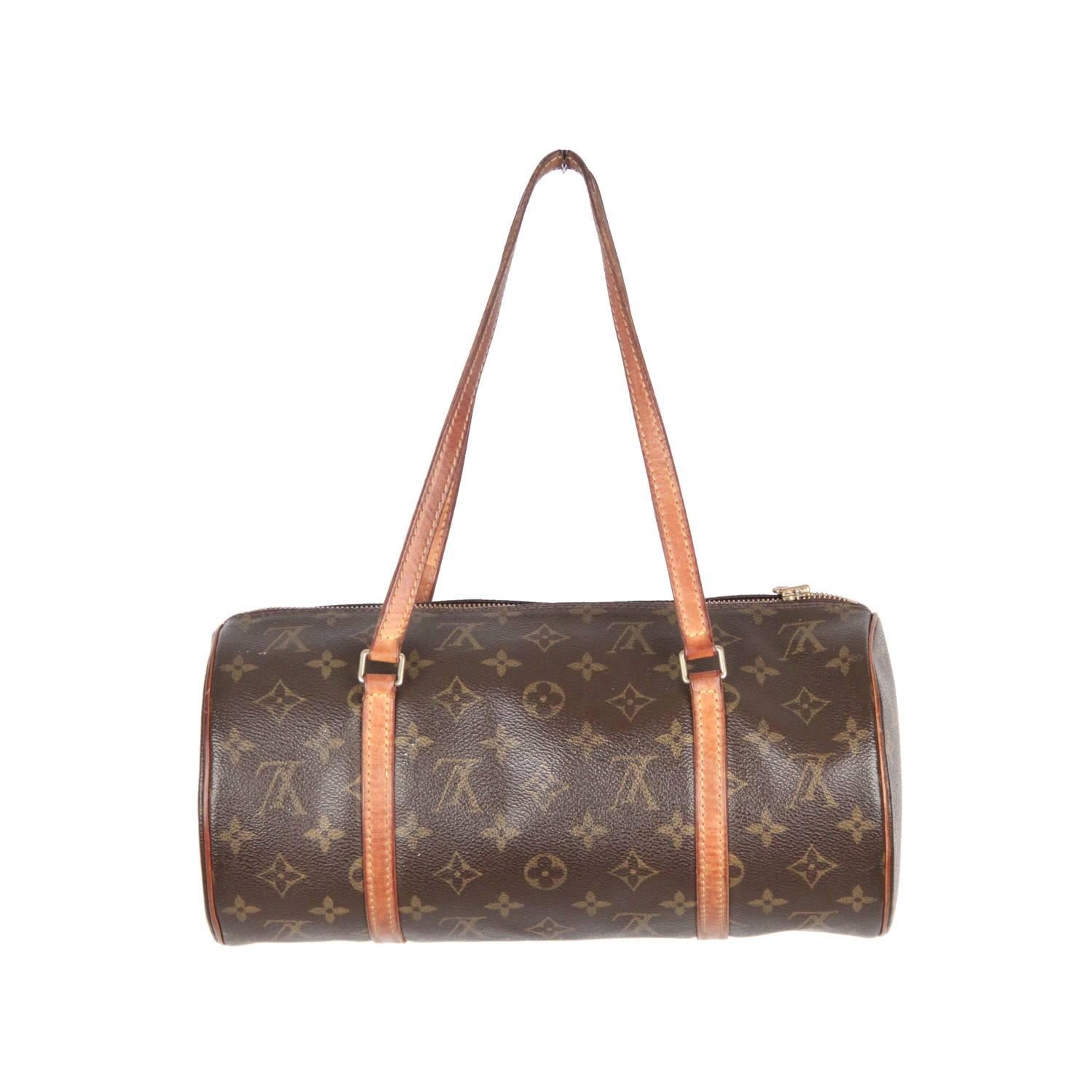 Gorgeous Louis Vuitton 'Papillon' Bag in monogram canvas. The classic rounded shape with two straps is supposed to take the form and spirit of the butterfly ('Papillon' in French). It was originally designed by Henri Vuitton in 1966 and has become