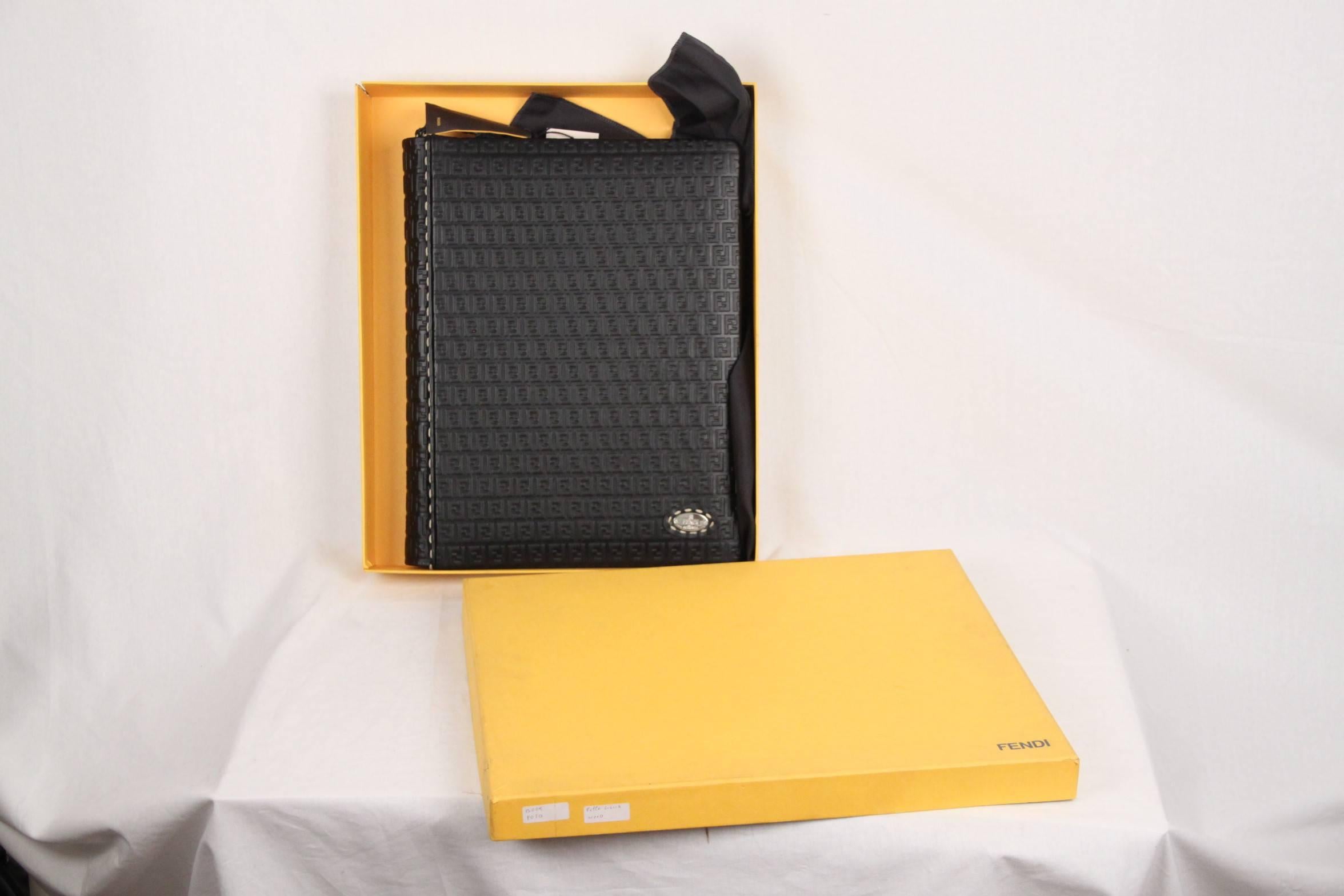 - Limited edition FENDI SELLERIA photo album - handcrafted by FENDI master saddlers.

- Black leather cover with allover embossed FF monograms

- Contrasting stitchings

- 28 blank pages with transparent protective sheets in between each page

-