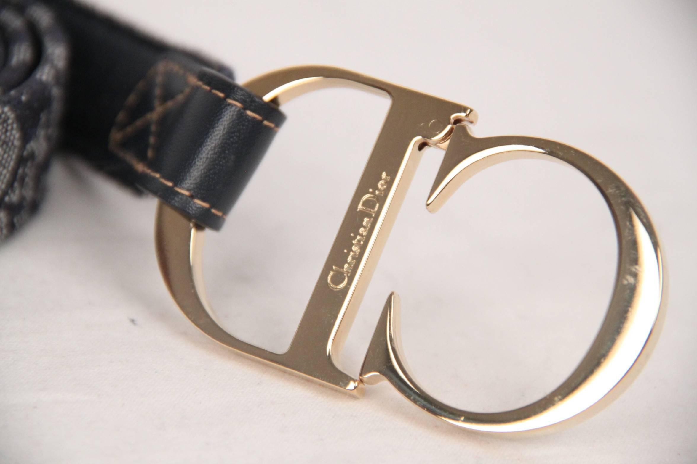 - Beautiful Christian Dior belt
- Blue monogram canvas & leather
- Gold metal CD buckle
- It fastens with Velcro fastener over the 'C'
- Width: 1 inch - 2,5 cm
- Total lenght: 39 inches - 99 cm

Logos / Tags: 'CHRISTIAN DIOR Paris' embossed on