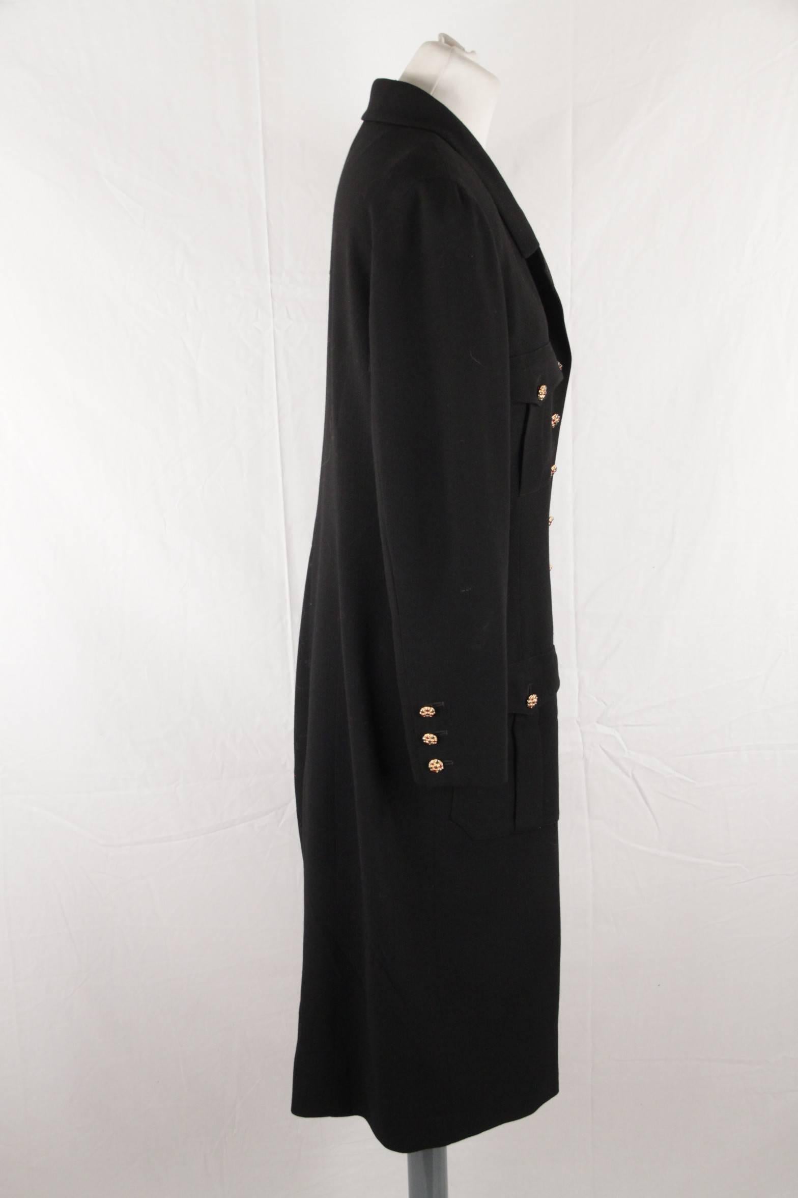  

- Black wool velvet buttoned dress from Chanel 
- Gold metal Gripoix buttons
- Long sleeves with buttoned cuffs
- Center front button opening 
- Silk lining
- Size: 44(The size shown for this item is the size indicated by the designer on the