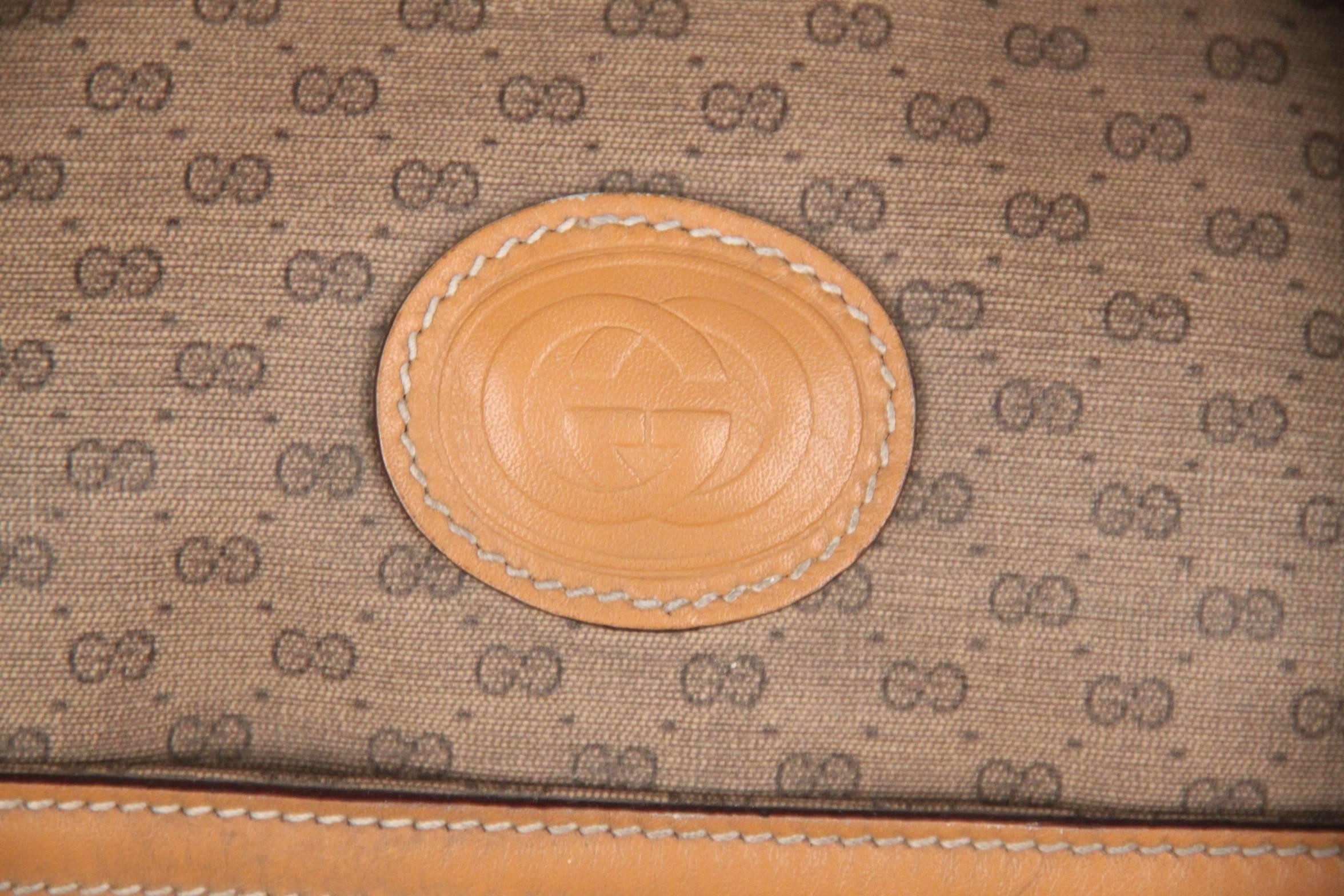 - Vintage GUCCI Weekender / Travel Bag

- Tan GG - GUCCI Monogram Canvas with Genuine Leather trim

- Upper zipper closure

- 1 open pocket and 1 zip pocket on the front

- Measurements: 12 x 18 1/2 x 9 inches - 30,5 x 47 x 22,8 cm


Logos / Tags: