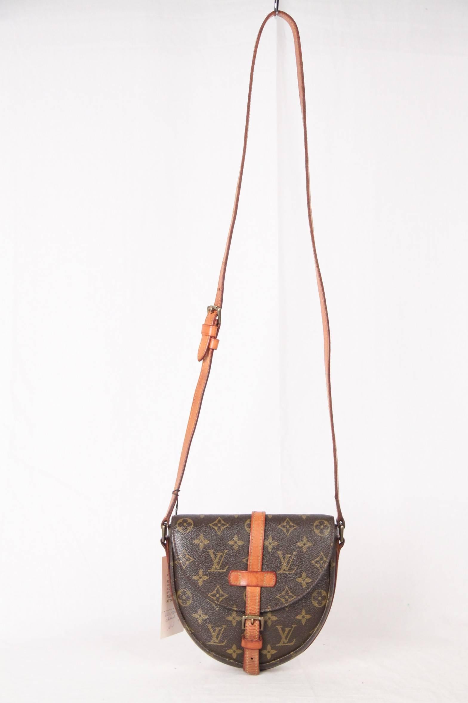 Brown monogram canvas 'Chantilly'crossbody bag from Louis Vuitton. Featuring a rounded shape and has a versatile adjustable shoulder strap that can be worn on the shoulder or cross-body for hands-free convenience. Foldover top, a buckle fastening