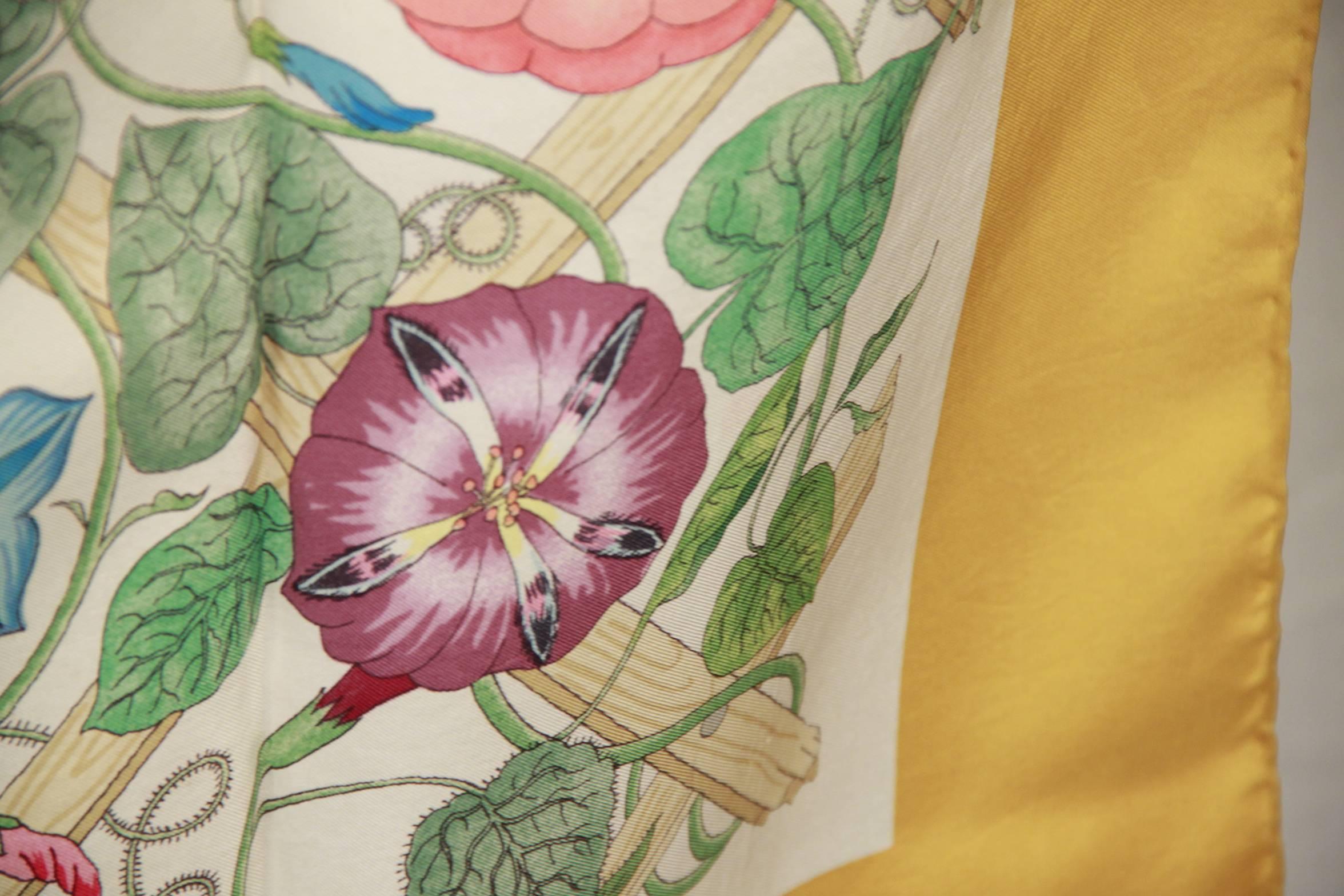 - Title: 'Traliccio' (Trellis, Lattice)
- Designed by Vittorio Accornero for GUCCI in 1968
- Multicolor floral design with yellow border
- 100% Silk
- Measurements: 34.5 x 33 inches - 87,5 x 83,8 cm
- GUCCI box included


Logos / Tags: Printed GUCCI
