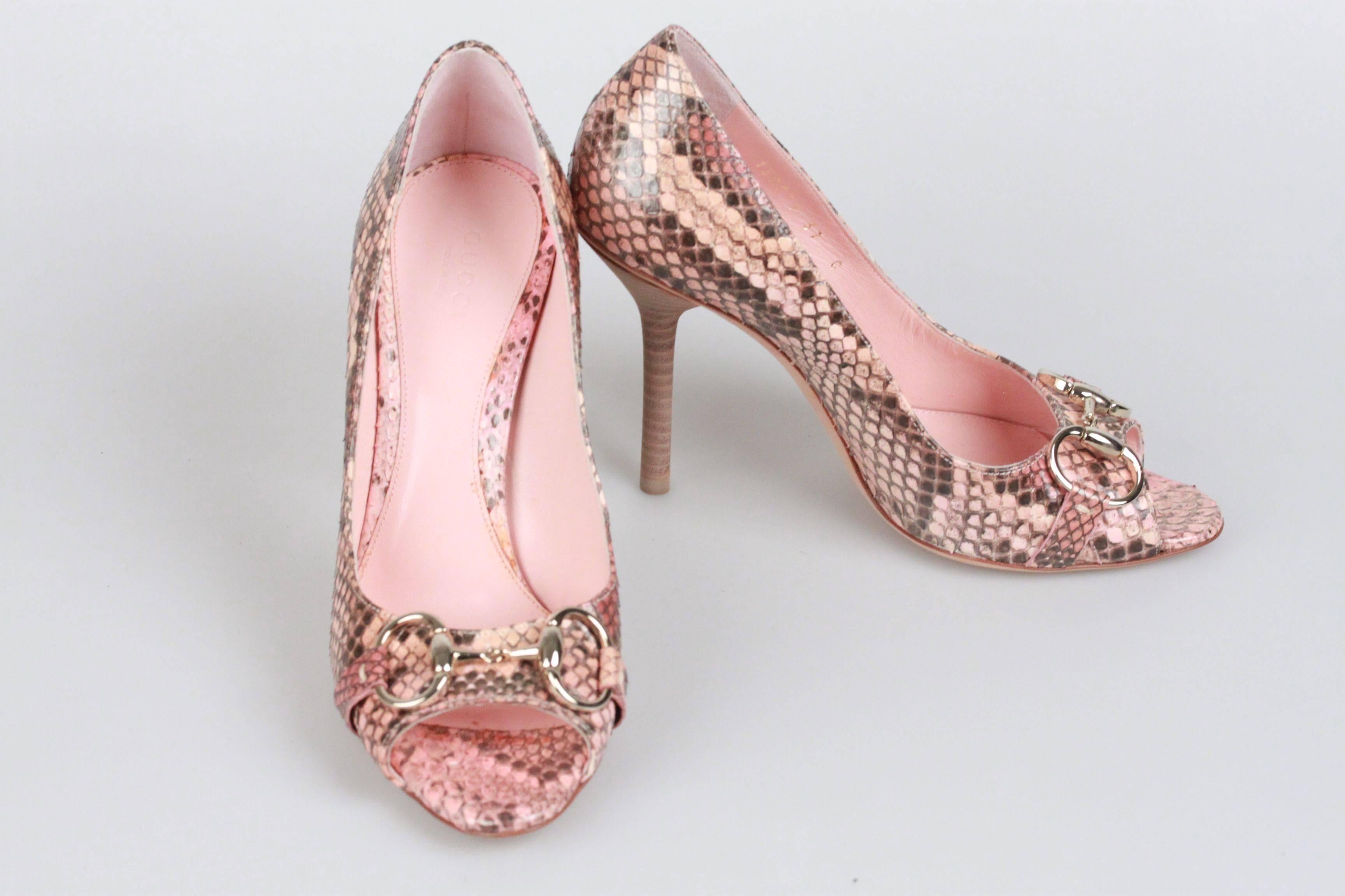 - GUCCI 'HOLLYWOOD' Peep Toe Shoes
- Pink Python
- Stiletto heels (4.25 inches - 10,7 cm)
- Open toe
- Light gold horsebit detailing on the toes
- Slip-on style
- Leather insole and outsole
- Size: 37C
- GUCCI dustbags included
 