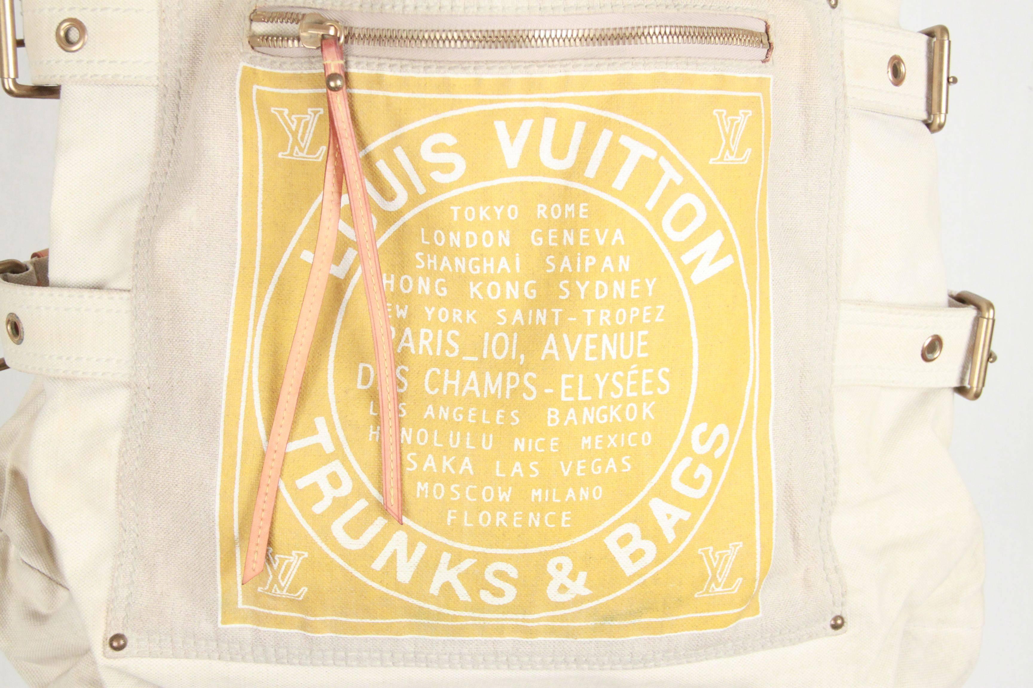 - Collectible Louis Vuitton GLOBE Cabas GM tote 
- Limited edition piece is from the Globe Shopper line, designed for the Cruise 2005 Collection
- It is made from a beige cotton and linen canvas perfectly screen printed a yellow "Trunks and