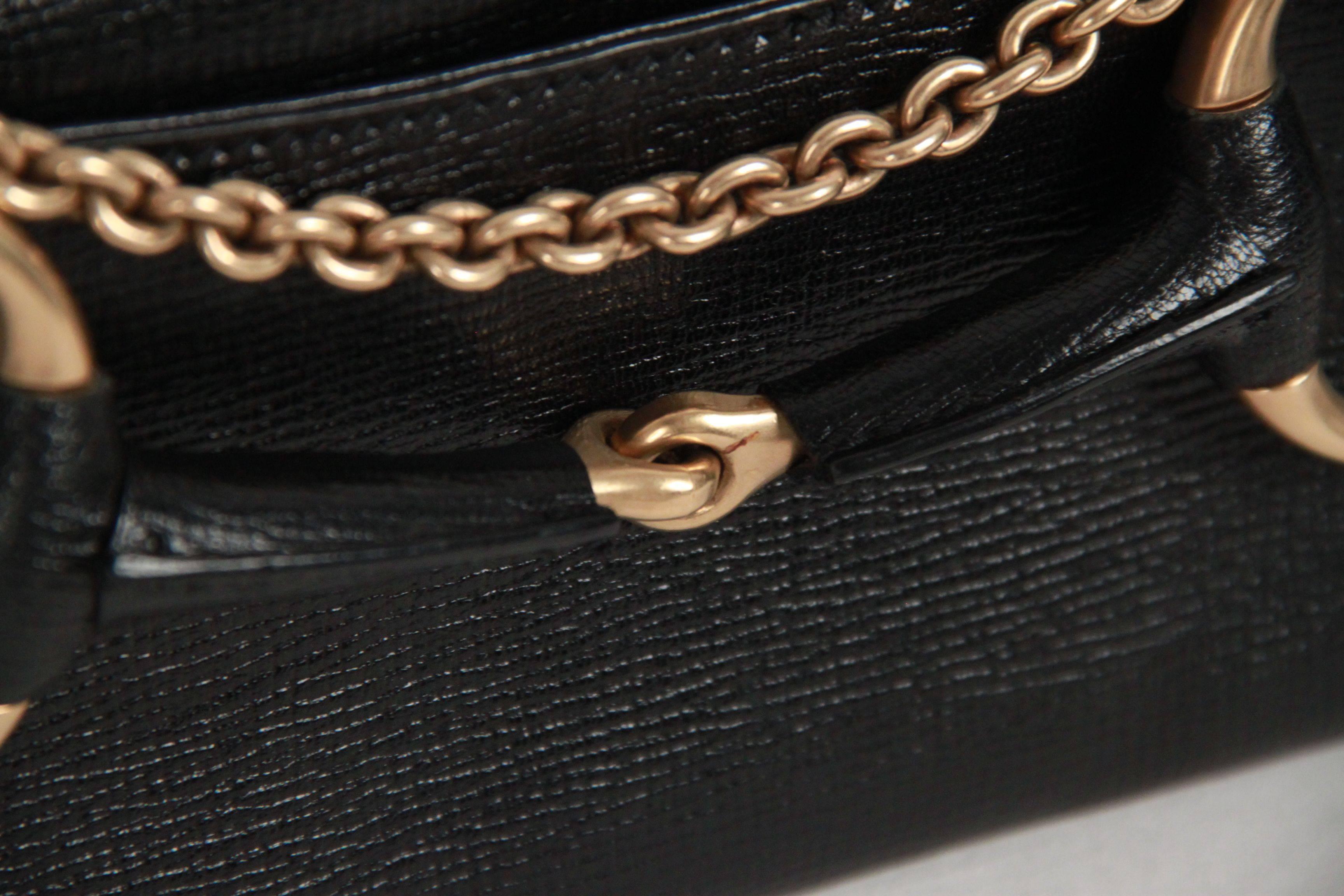 Rare Gucci clutch shoulder bag from the TOM FORD Era. It is crafted in textured black leather and it features iconic horsebit detailing on the front and removable gold metal chain strap. Can be worn as a shoulder bag or as a clutch bag if you remove