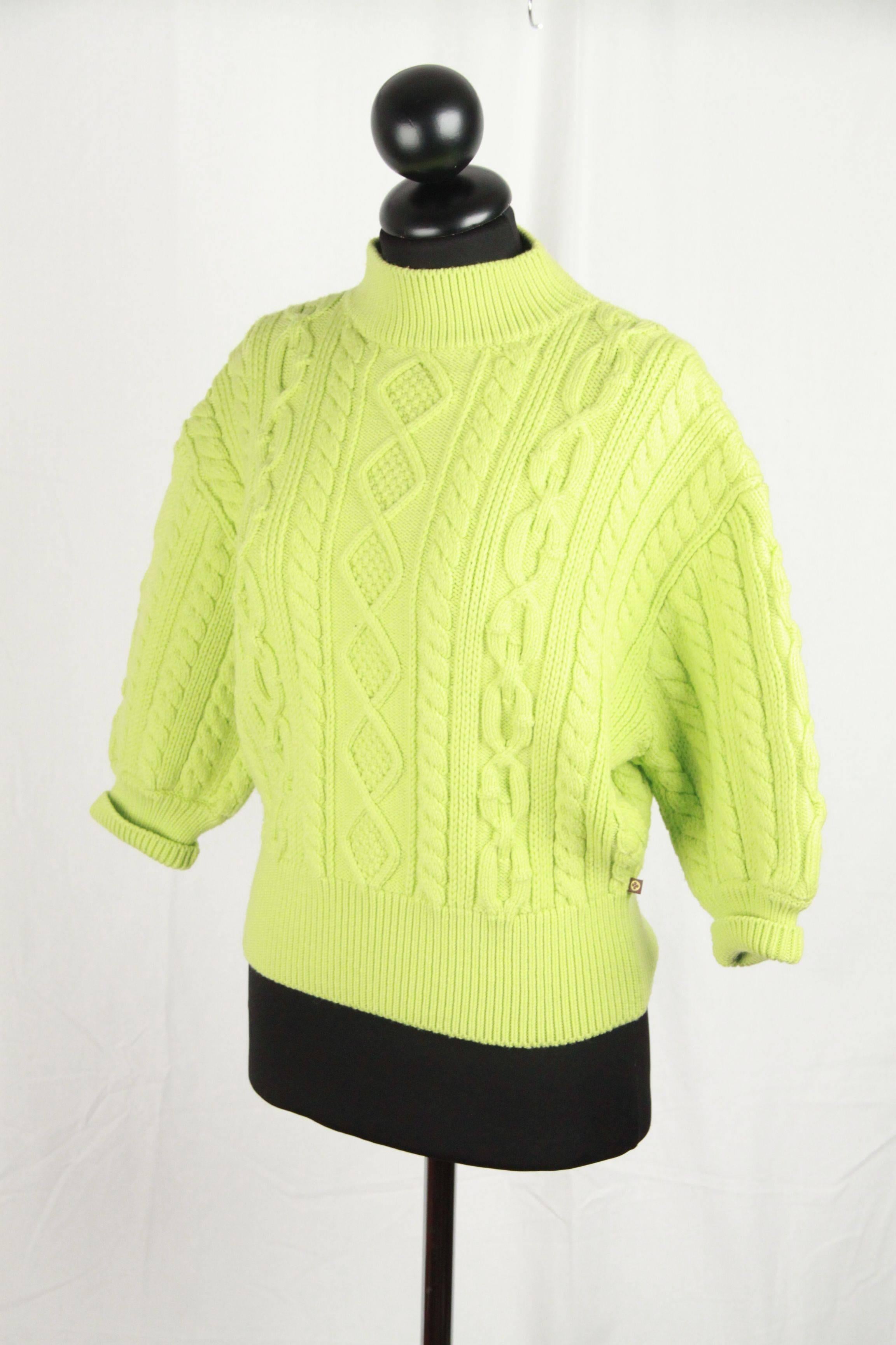 - Louis Vuitton acid green cable knit sweater 
- Composition: 81% wool, 19% nylon
- Cropped sleeves
- Funnel collar
- Size M (The size shown for this item is the size indicated by the designer on the label) 
 
Logos & Tags: 'LOUIS VUITTON Paris'