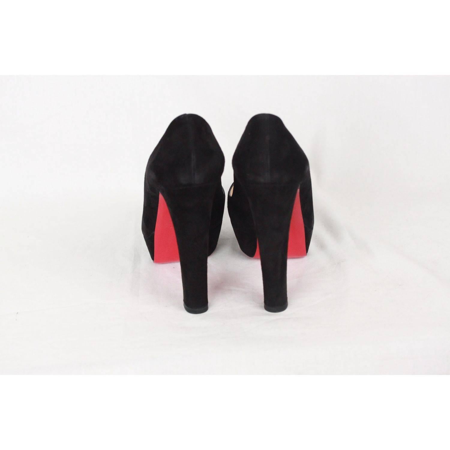 - Christian Louboutin peep toe heels
- Model: 'BAMBOU 140'
- Black suede
- 5.5 inches - 14 cm covered block heels
- Platform: 1 inch - 2,5 cm 
- Signature red leather outsole
- Made in Italy
- Size: 37 1/2 (The size shown for this item is the size