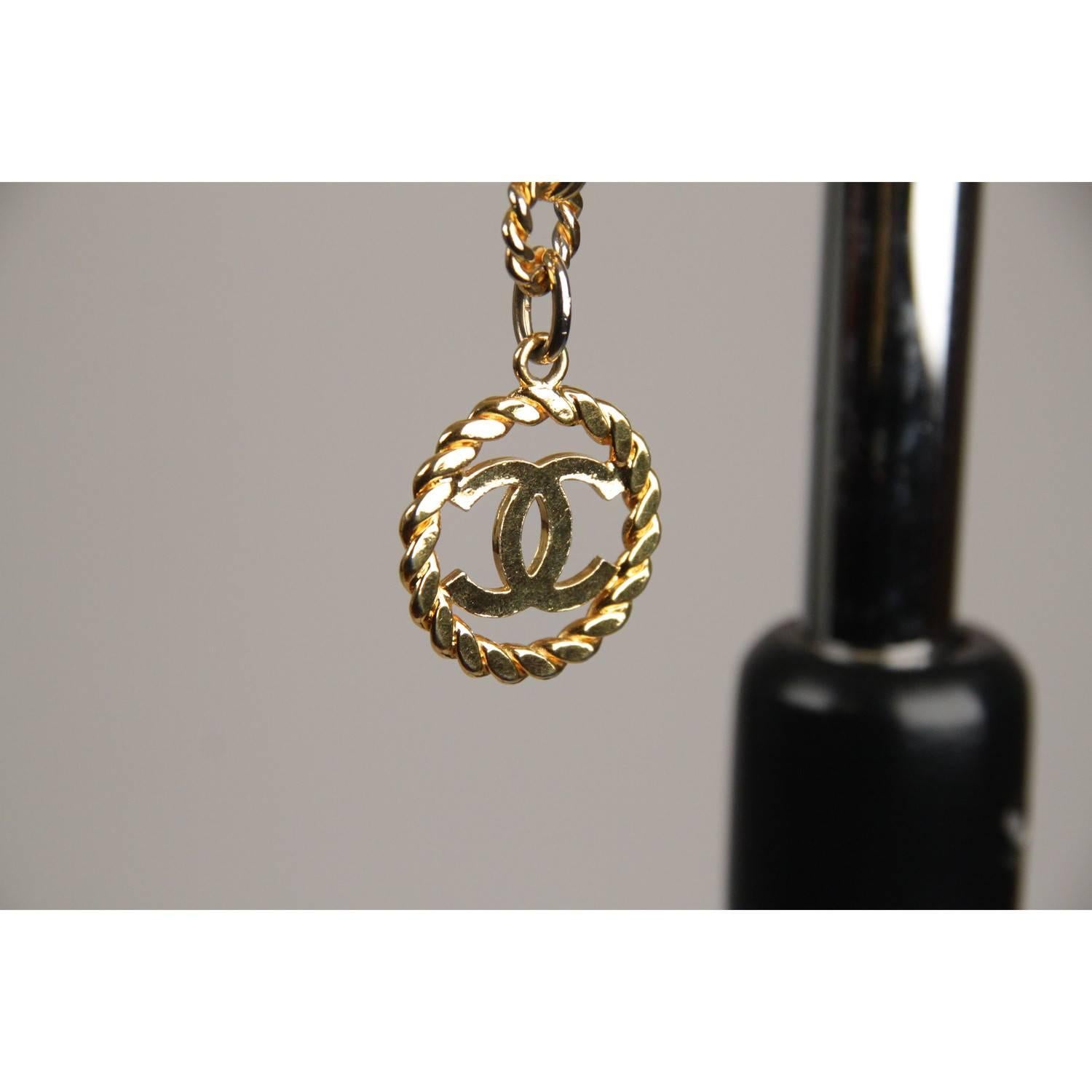 - Classic vintage Chanel triple row chain necklace/belt 
- Period/Era: late 80s/early 90s
- It is very versatile and will complete every look (you can use it as a necklace or as a belt)
- Gold metal
- Features 'CC CHANEL' pendant
- Hook chain