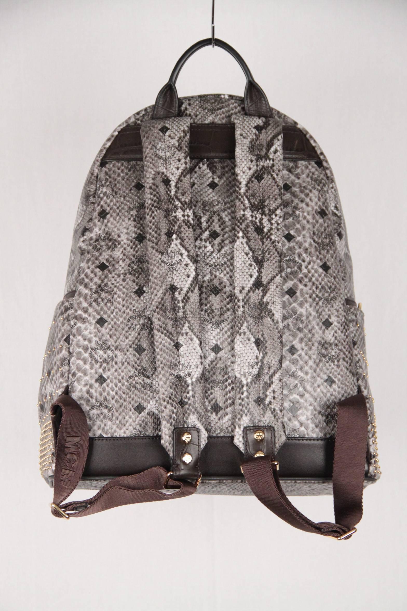 mcm snakeskin backpack