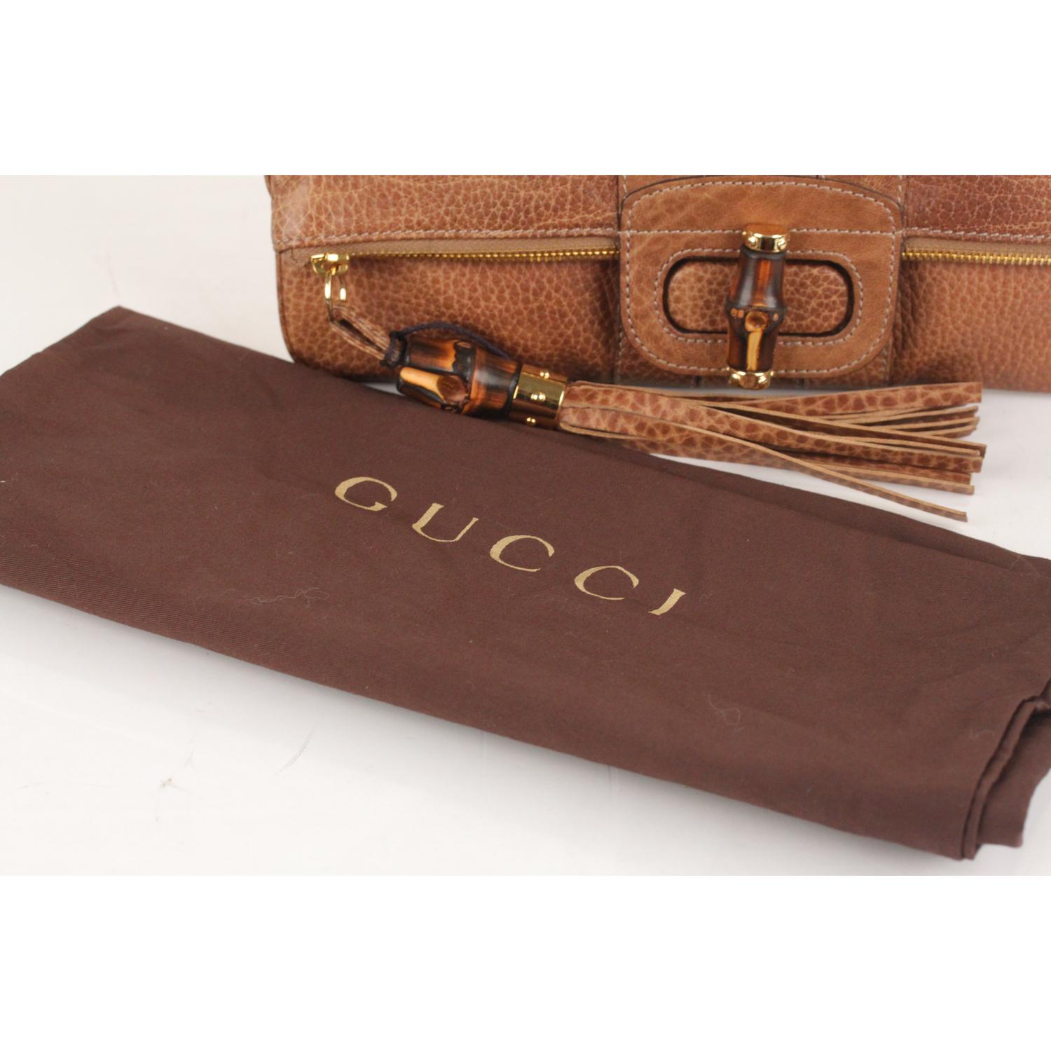 Gucci Tan Leather Bamboo Tassel Lucy Folding Clutch Bag In Excellent Condition In Rome, Rome