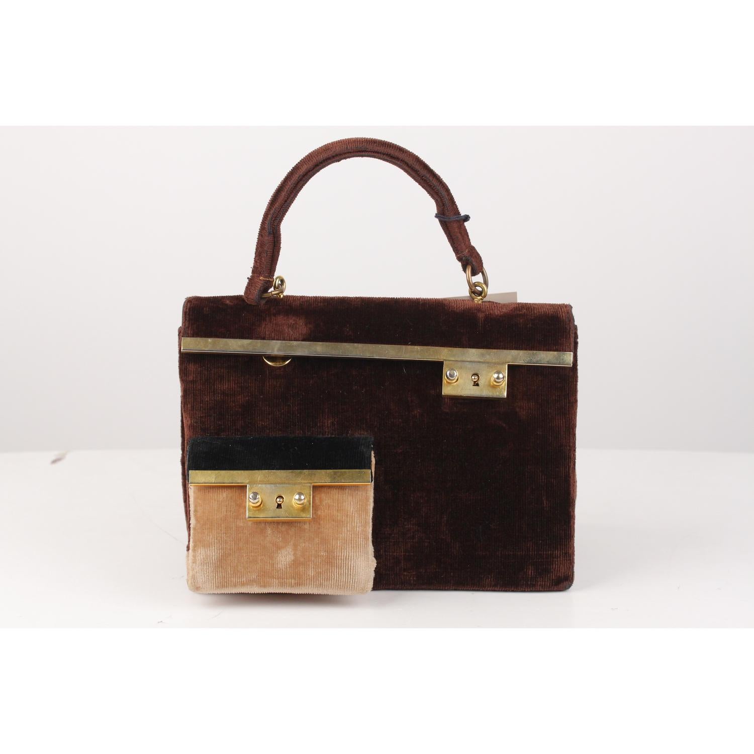 Roberta Di Camerino brown, beige and black velvet handbag with matching coin purse. It features a small compartment on the front with keyhole detailing. Button closure and single top carry handle. Leather lined interior with 2 main sections and 1