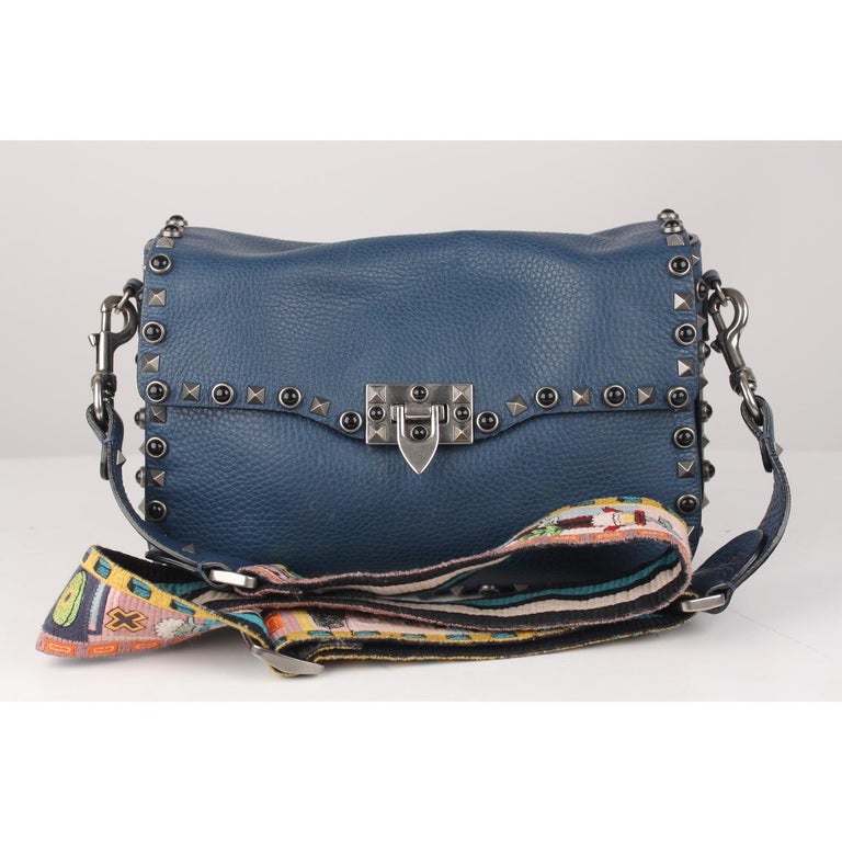 Valentino Garavani Blue Leather Rockstud Rolling Messenger Bag For Sale at 1stDibs