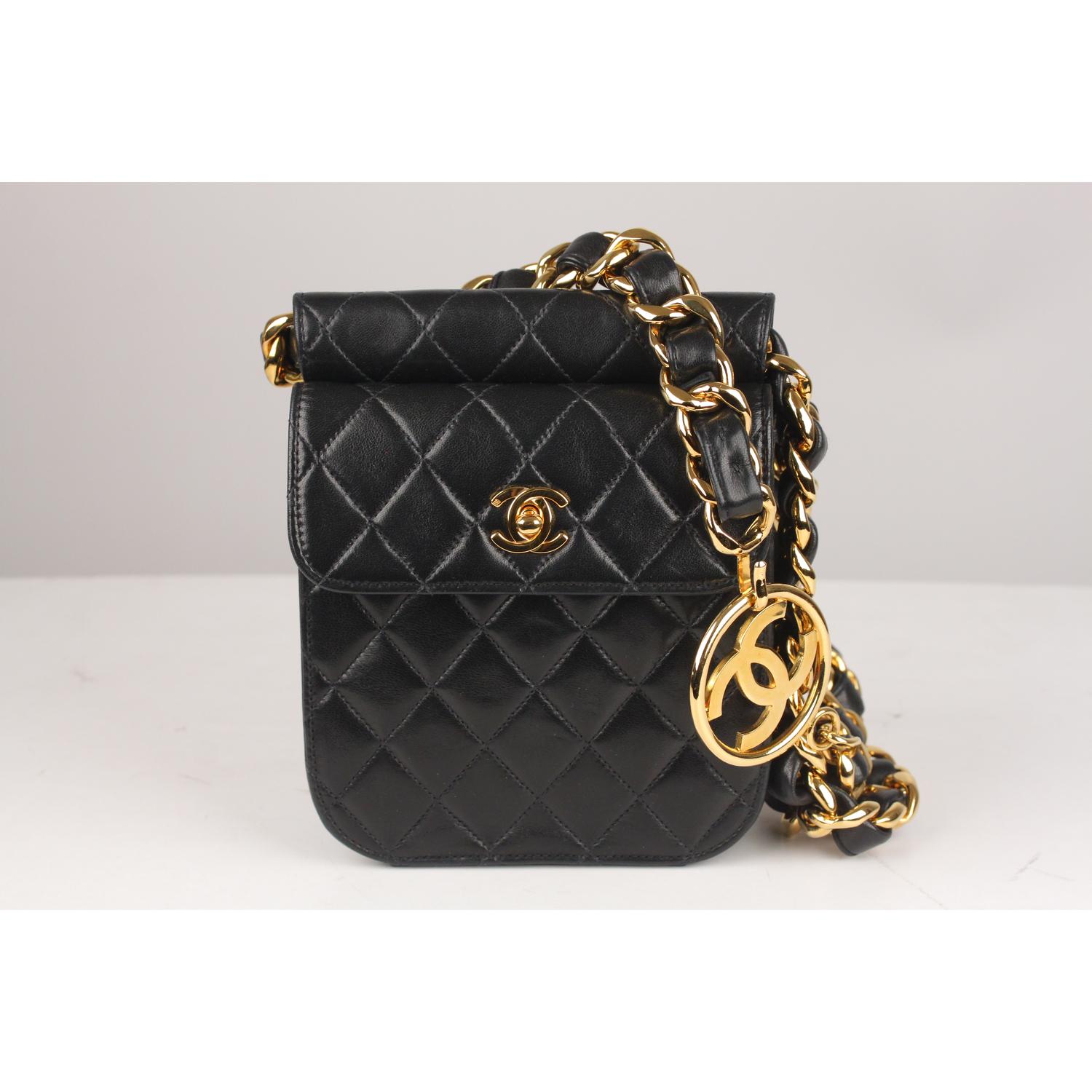 This bag will come with a Certificate of Authenticity provided by Entrupy, at no further cost.

- Chanel black quilted leather waist bag 
- Period/Era: from the F/W 1992 collection
- Chunky chain link and interwoven leather belt featuring big CC
