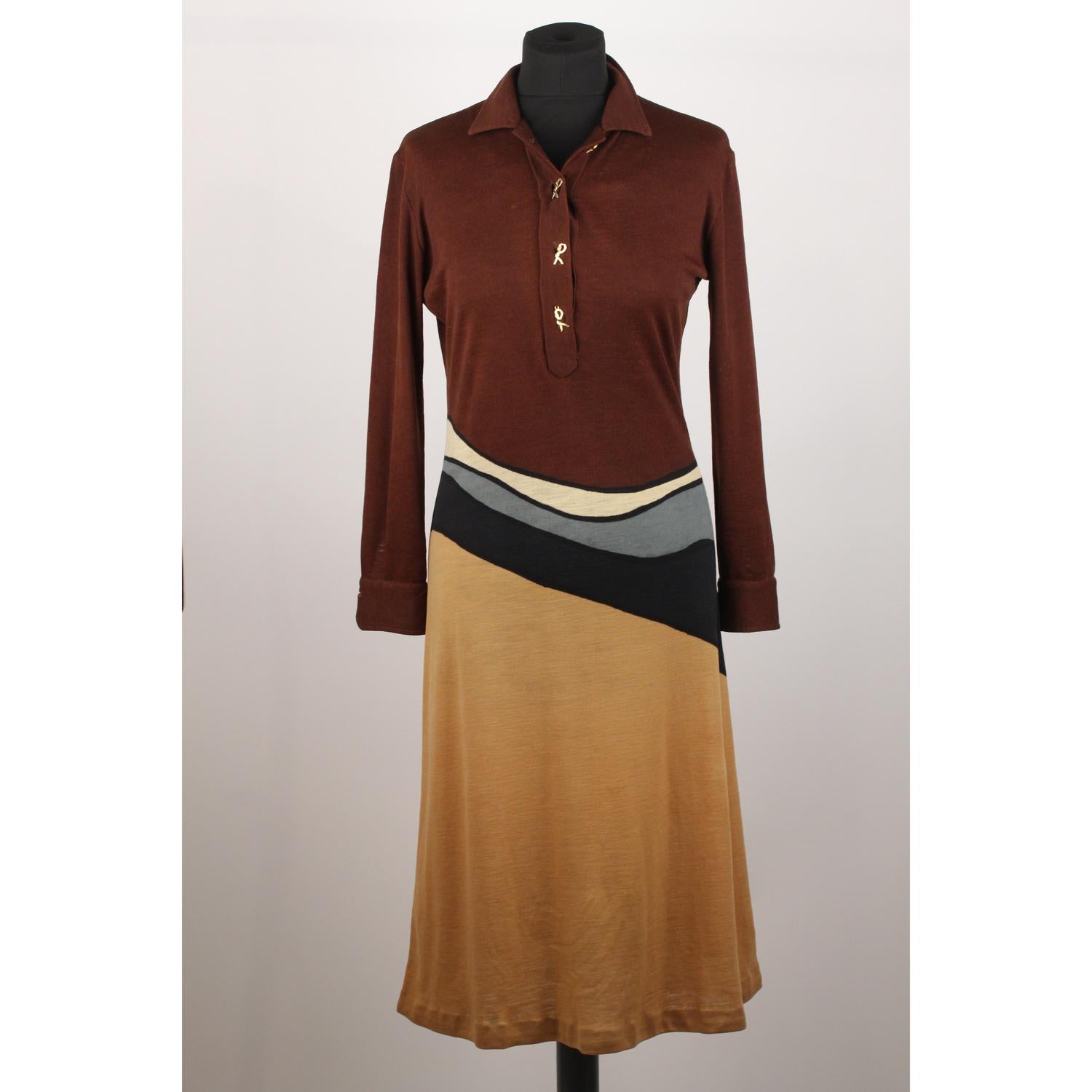 - Printed dress in brown colourway by Roberta de Camerino
- Logo R gold metal button
- Long Sleeve styling with buttoned cuffs
- Shirt collar
- Composition tag is missing! it seems to be a wool blend fabric, slightly stretch
- Unlined
- Circa