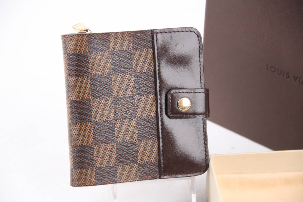 Brand: LOUIS VUITTON Paris - Made in Spain Logos / Tags: ' LOUIS VUITTON Paris - made in Spain' embossed inside, signed hardware. Authenticity serial number #CA0032(embossed inside the bill compartment) Condition rate & details (please read our