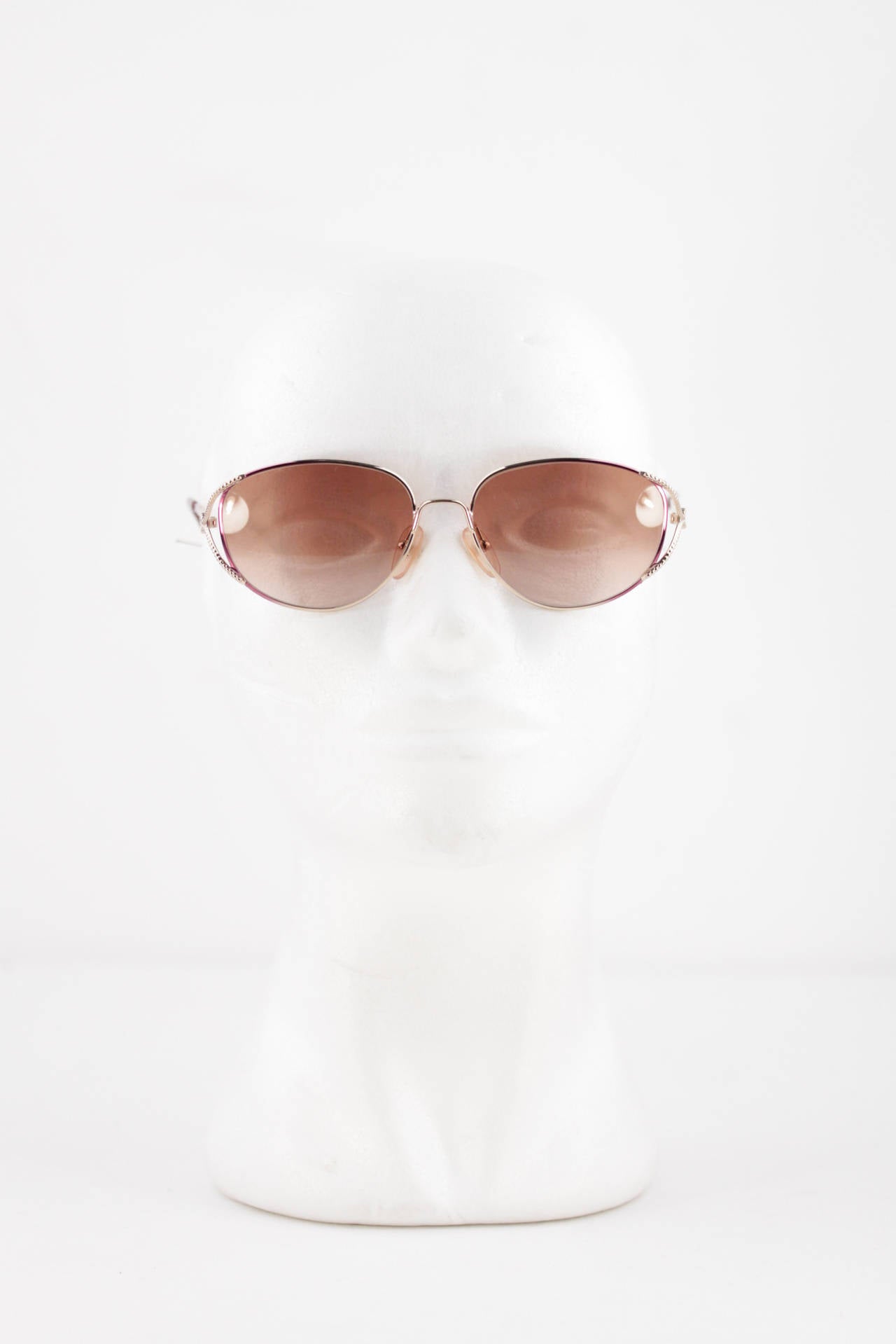 Brand: CHRISTIAN DIOR - OPTYL frame, Made in Austria

Style Name & Number: 2712 - 48 - 56/16 - 130

Frame color / effect: Gold metal Frame with purple accents (CD logos on the temples)

Lens color / effect: Gradient/Faded Brown