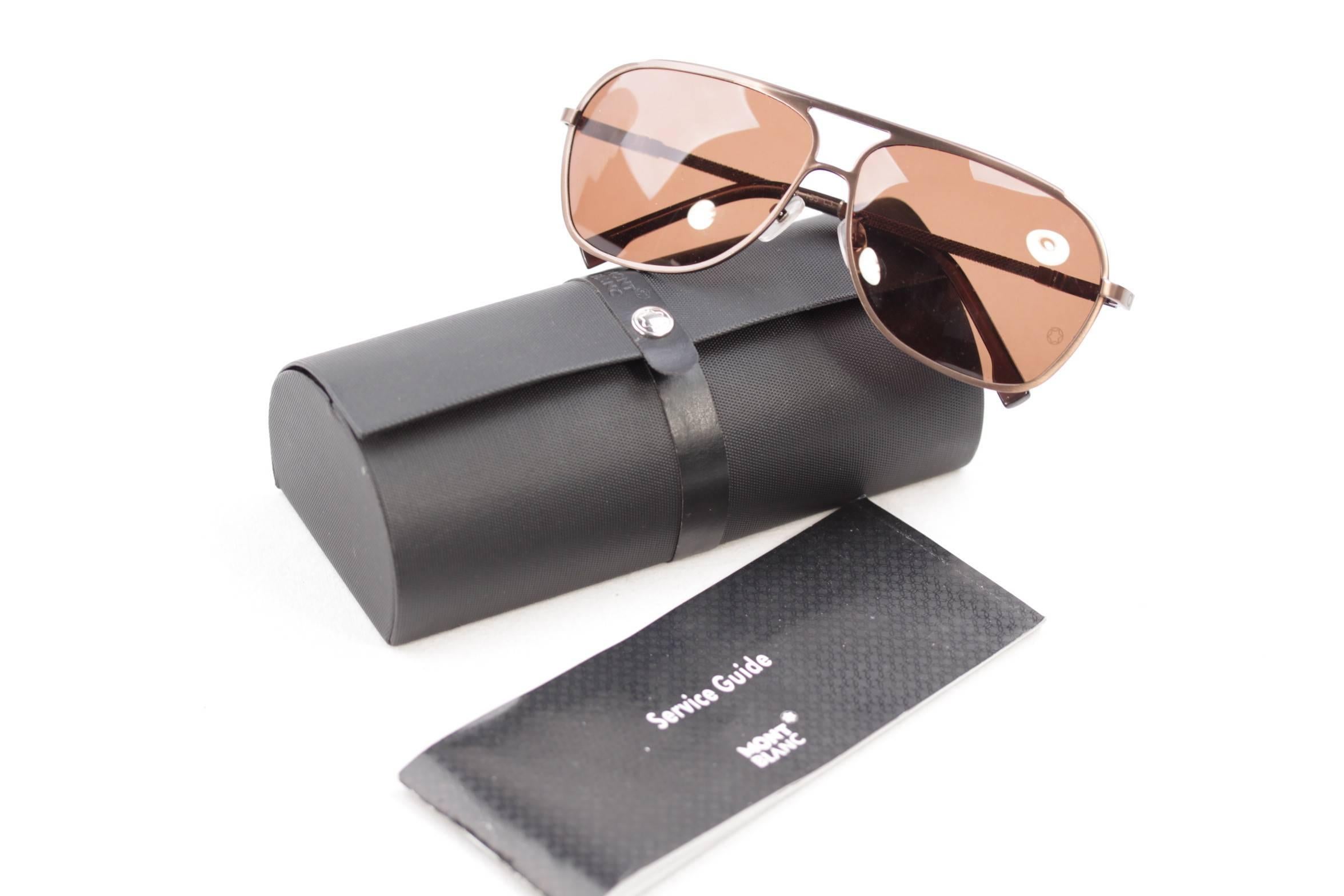 - Men sunglasses, signed MONTBLANC(Made in Italy)

- Brown polycarbonate lenses (original lenses w/ MONTBLANC logo)

- Brown metal frame

- MONTBLANC signatures on temples

- They will come with its original MONTBLANC case

Style name